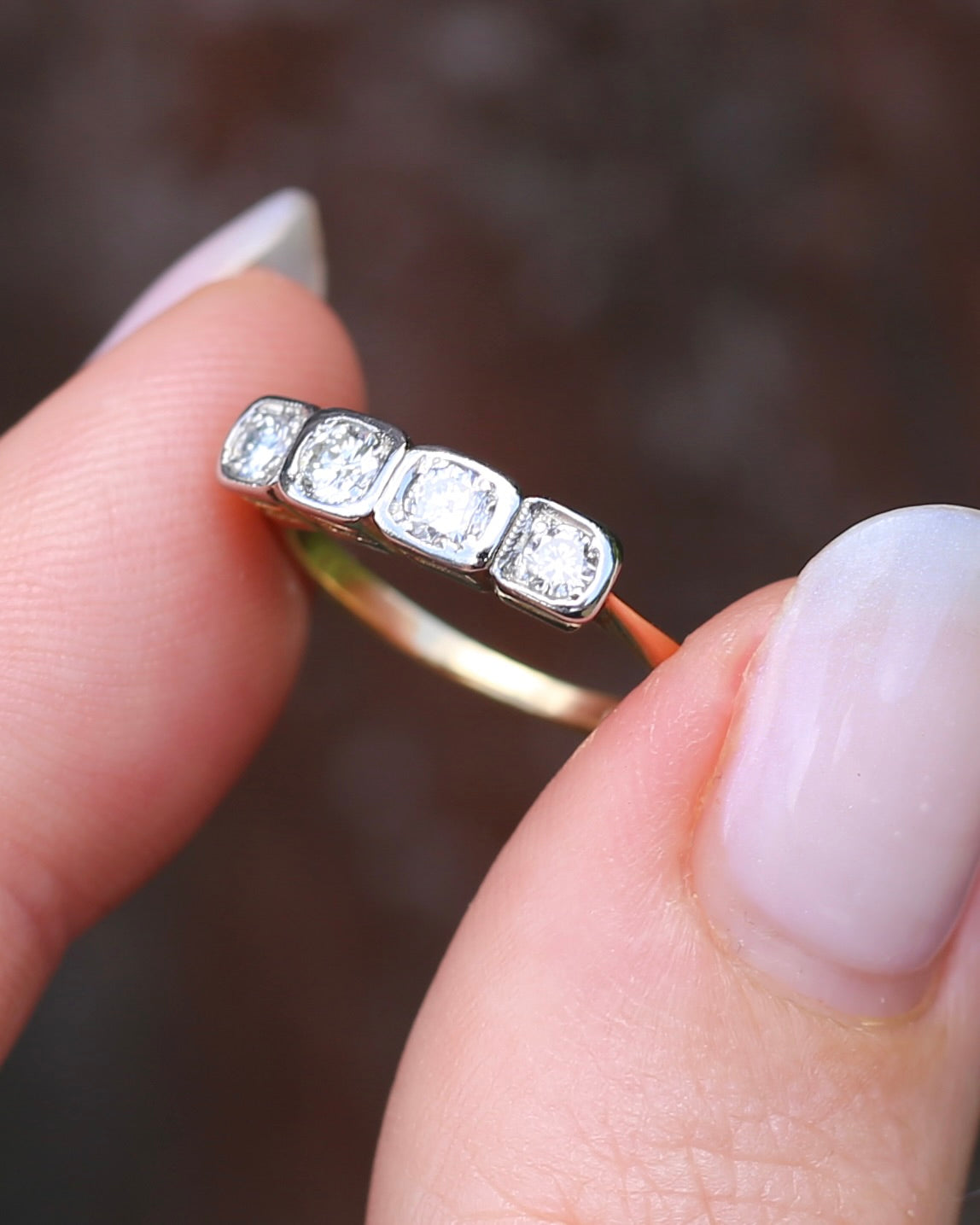 Circa 1930s Four Stone "Quadrillo" Diamond Ring, 18ct Yellow Gold and Paladium, size just over K1/2 or just over 5.5, 3.04g, with valuation