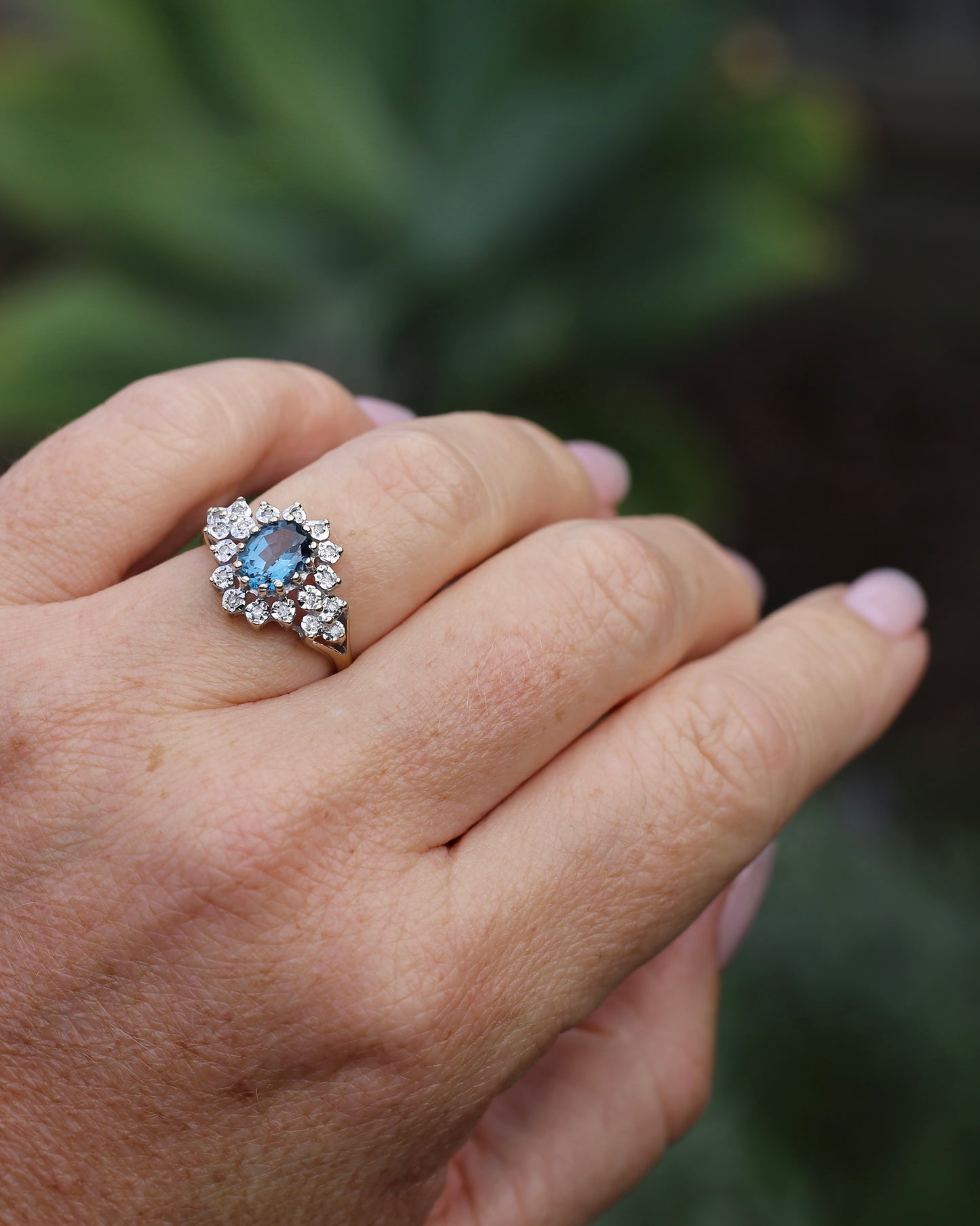 1989 Blue Zircon and Diamond Halo Ring, 9ct Yellow and White Gold, size N1/2 or 7, 3.18g