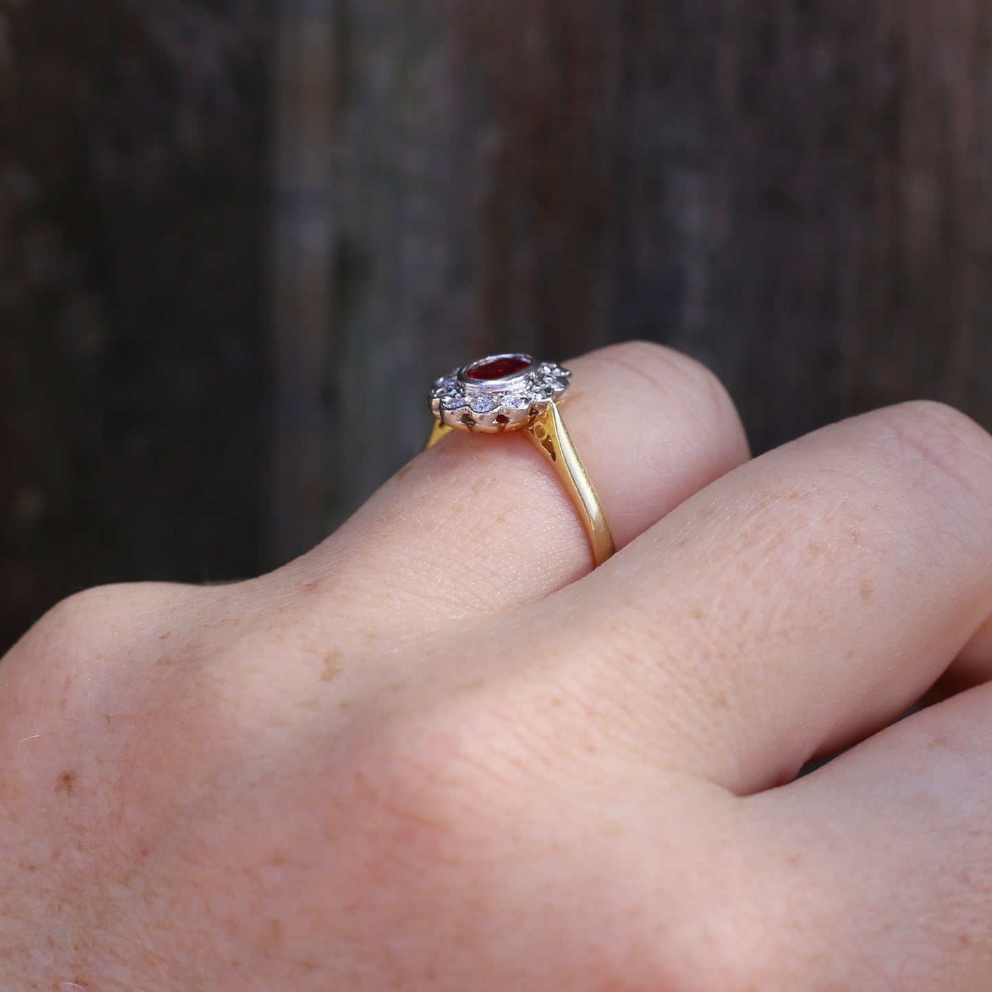 Ruby and Diamond Halo, 18ct Yellow and White Gold, size P or 7.75 with valuation