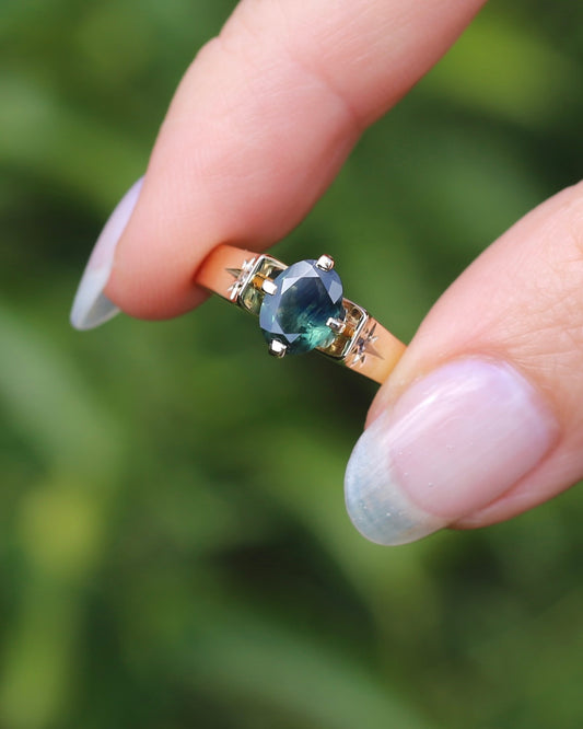 Circa 1970s 1.2ct Oval Australian Parti Sapphire Ring with Star Set Diamond Side Stones, 9ct Yellow Gold, size R1/2 or 8.75, 3.28g