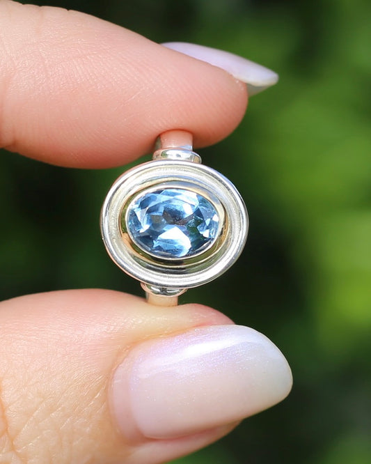 3.1ct Oval Blue Topaz Bezel Set Mixed Metal Ring, 9ct Yellow Gold and Sterling Silver, size K1/2 or 5.5, 3.55g