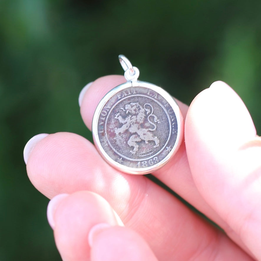 Global Coins in Silver Bezel Frames