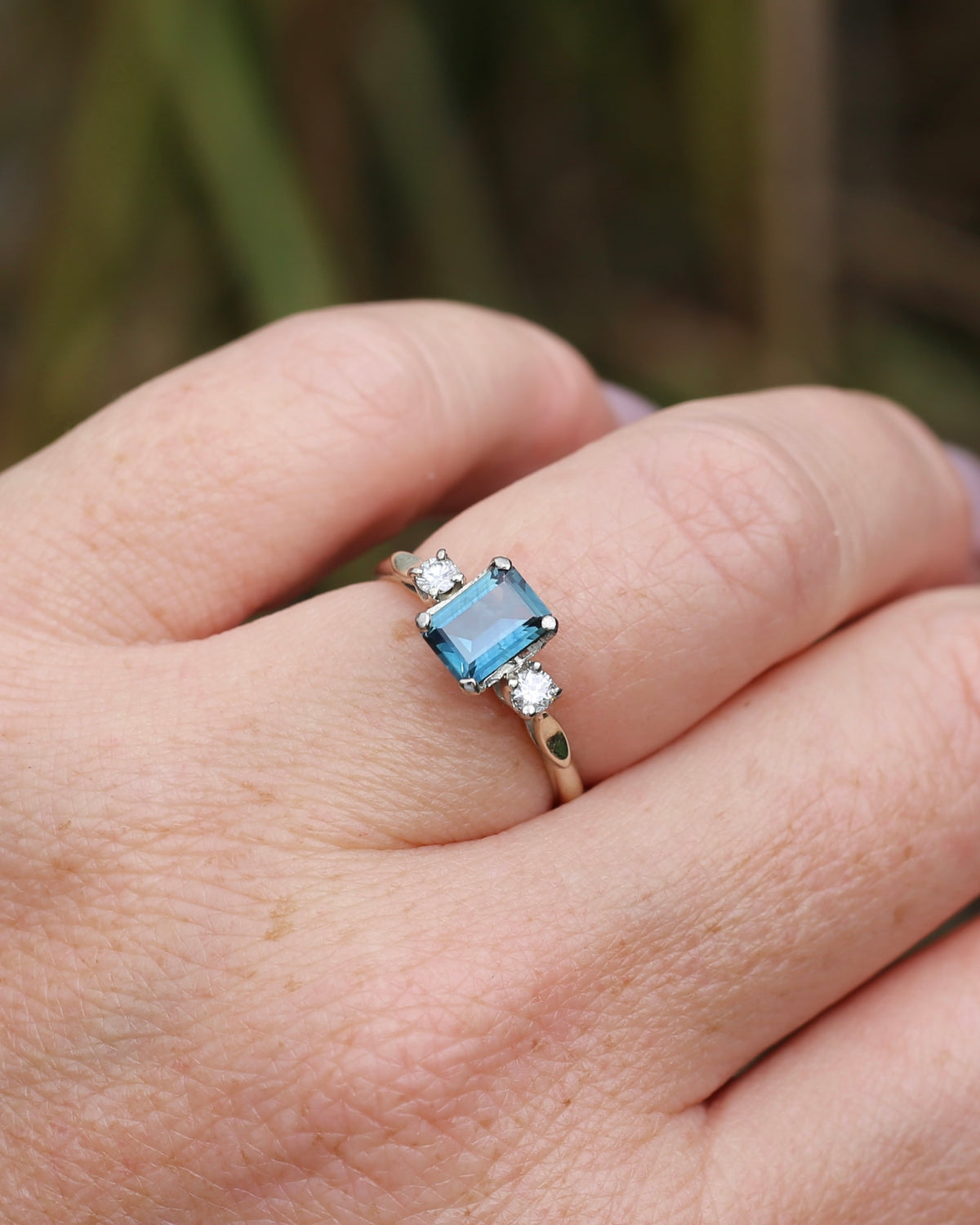 1.1ct Emerald Cut Natural Blue Teal Sapphire and Diamond Trilogy, 18ct White Gold and Platinum, size O or just over 7, 2.27g