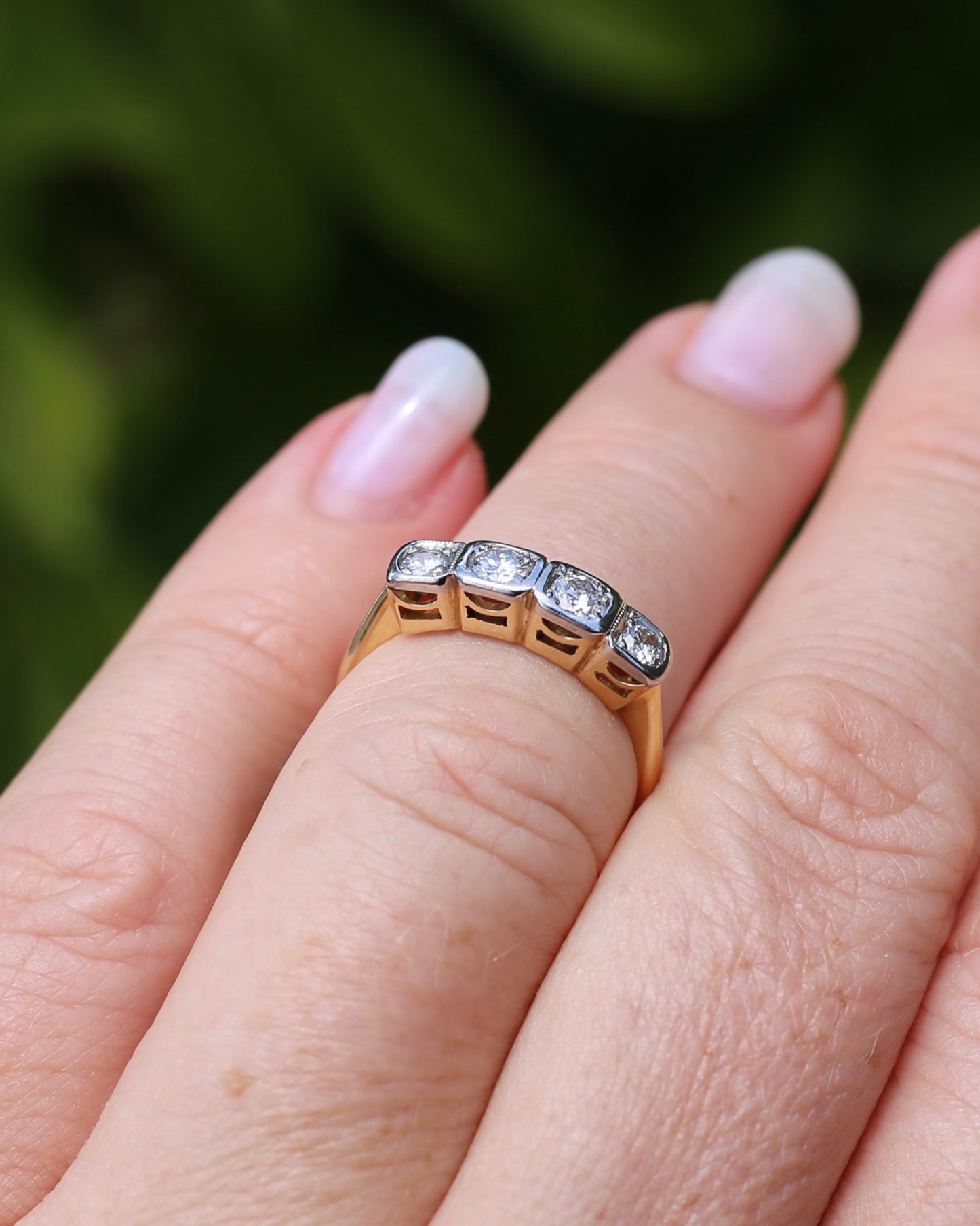 Circa 1930s Four Stone "Quadrillo" Diamond Ring, 18ct Yellow Gold and Paladium, size just over K1/2 or just over 5.5, 3.04g, with valuation