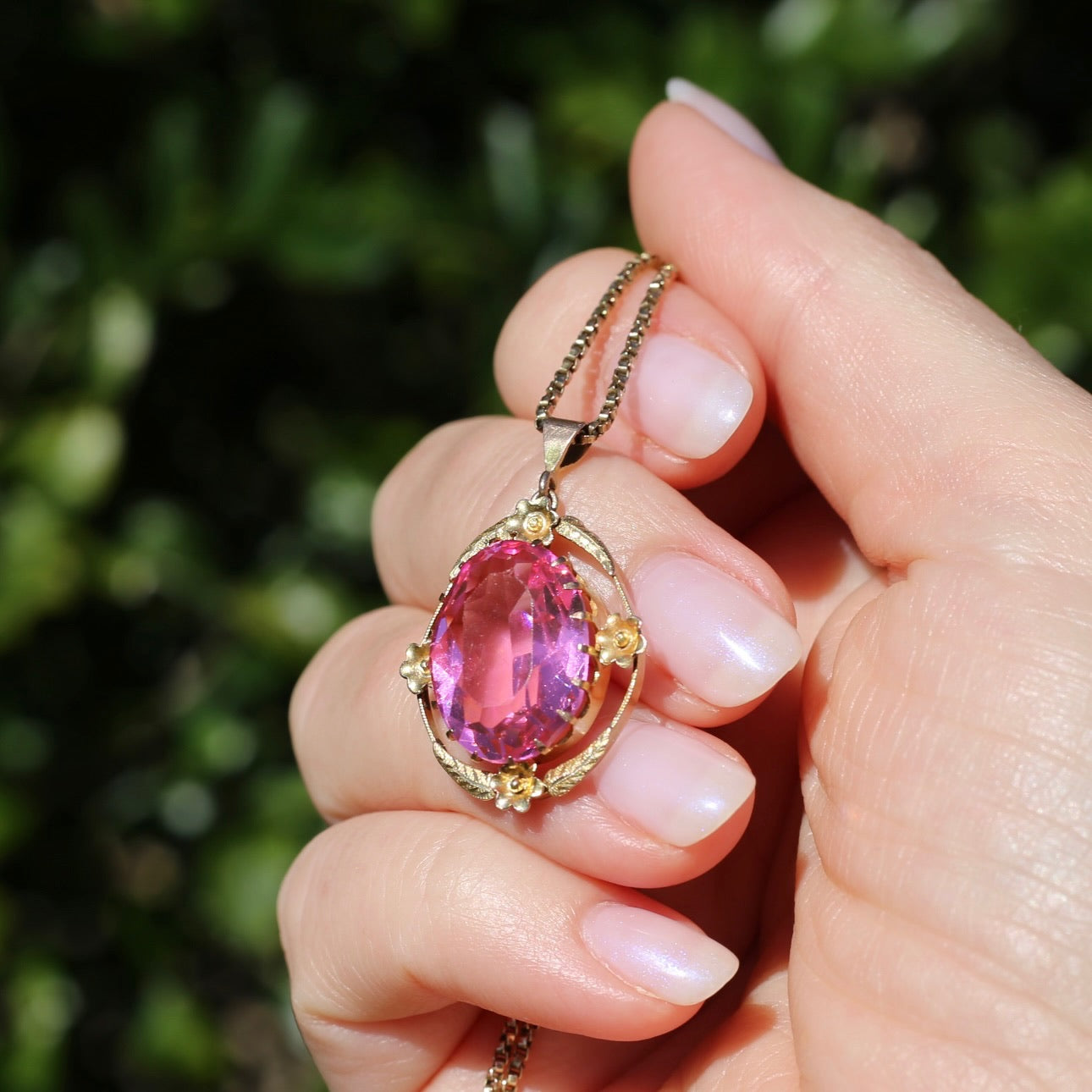 Circa 1930s-1950s Pink Paste Pendant in Decorative 9ct Gold Floral Surround, 4.23g