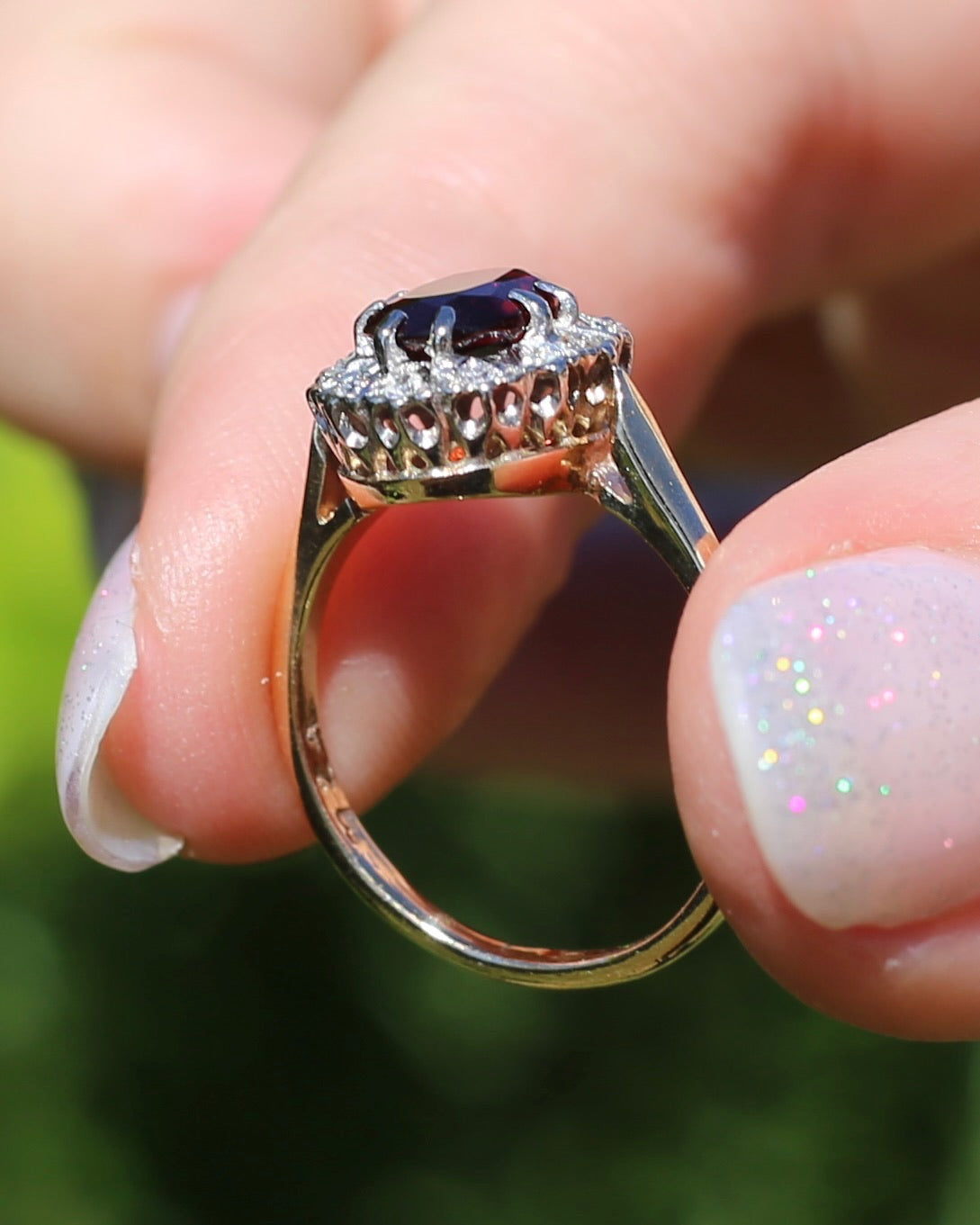 1974 Made Garnet and Diamond Halo Ring, 9ct Yellow and White Gold, size M1/2 or 6.5, 2.83g