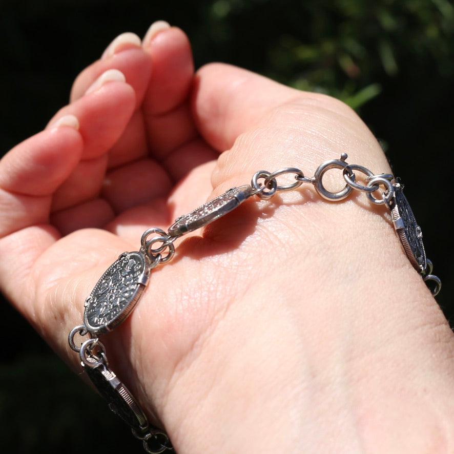 1960 - 1966 Sixpence Bracelet - set in 4 claw settings with double links, 20cm or 8 inches