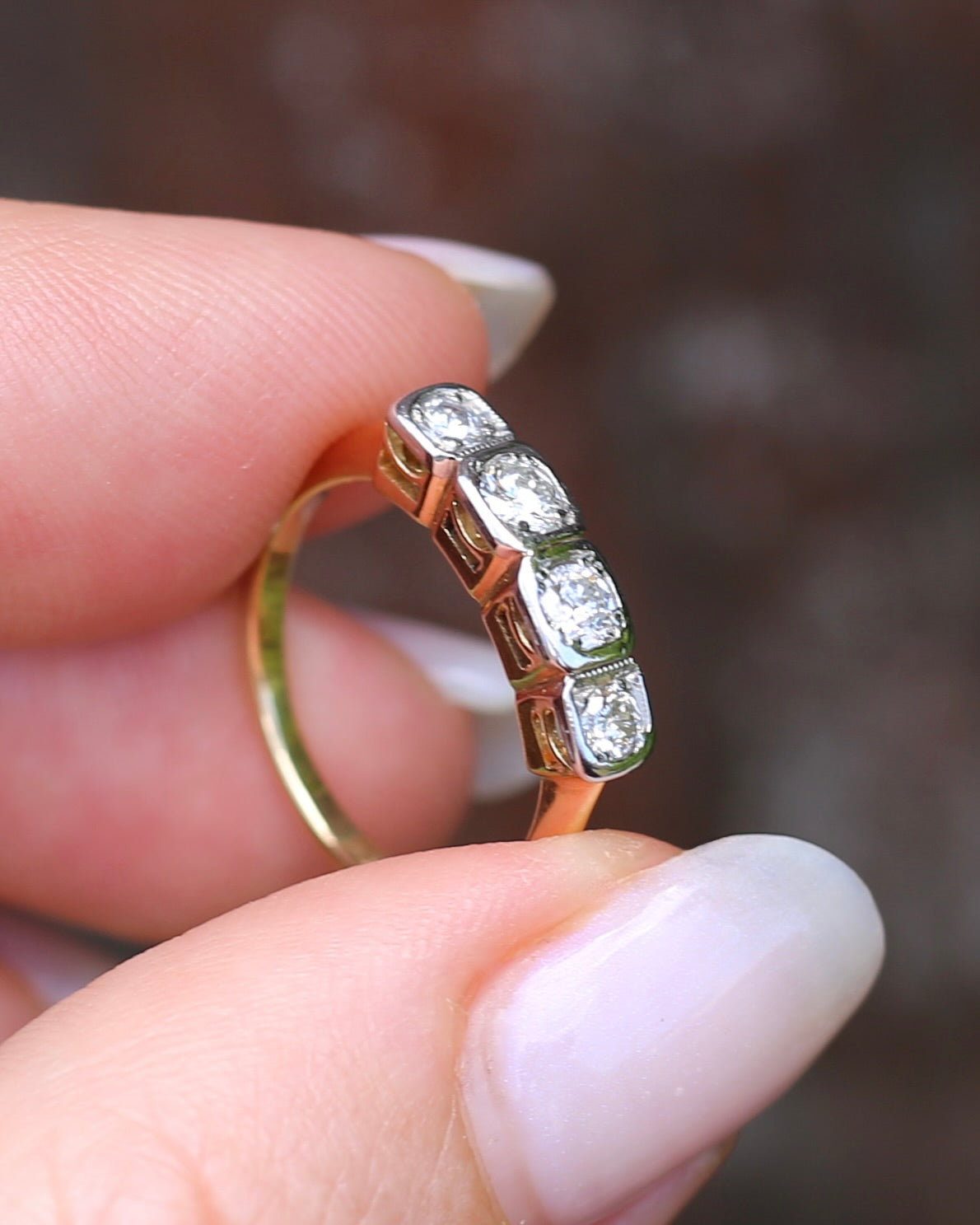 Circa 1930s Four Stone "Quadrillo" Diamond Ring, 18ct Yellow Gold and Paladium, size just over K1/2 or just over 5.5, 3.04g, with valuation