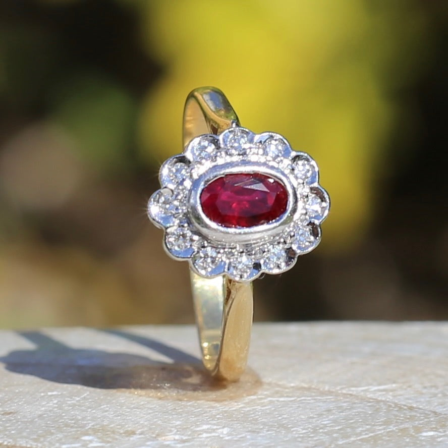 Ruby and Diamond Halo, 18ct Yellow and White Gold, size P or 7.75 with valuation