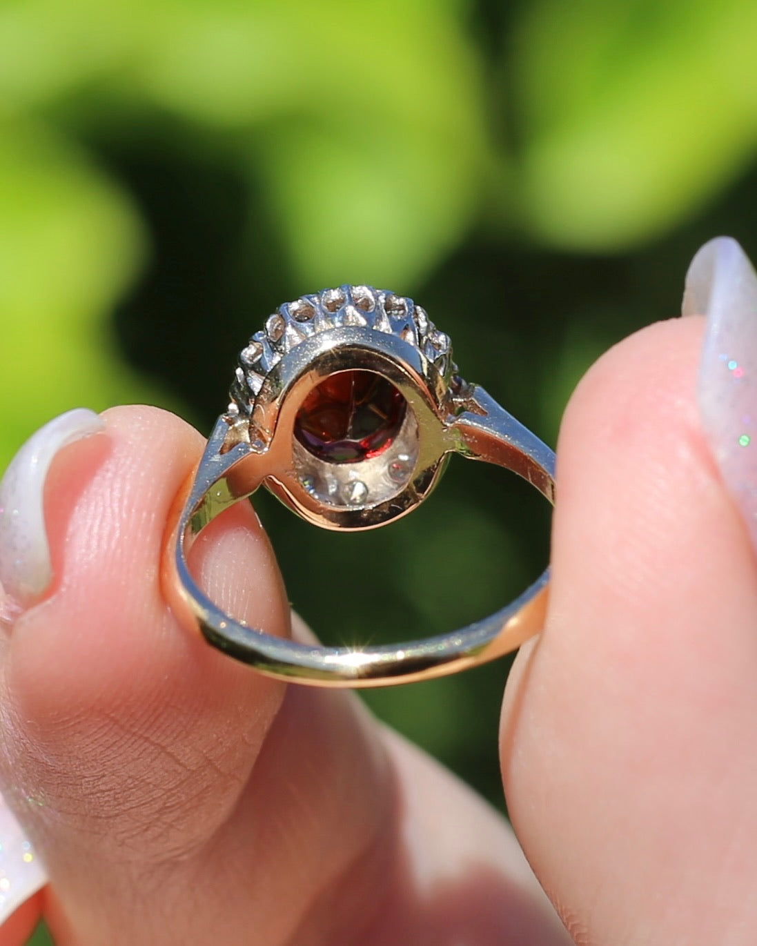 1974 Made Garnet and Diamond Halo Ring, 9ct Yellow and White Gold, size M1/2 or 6.5, 2.83g