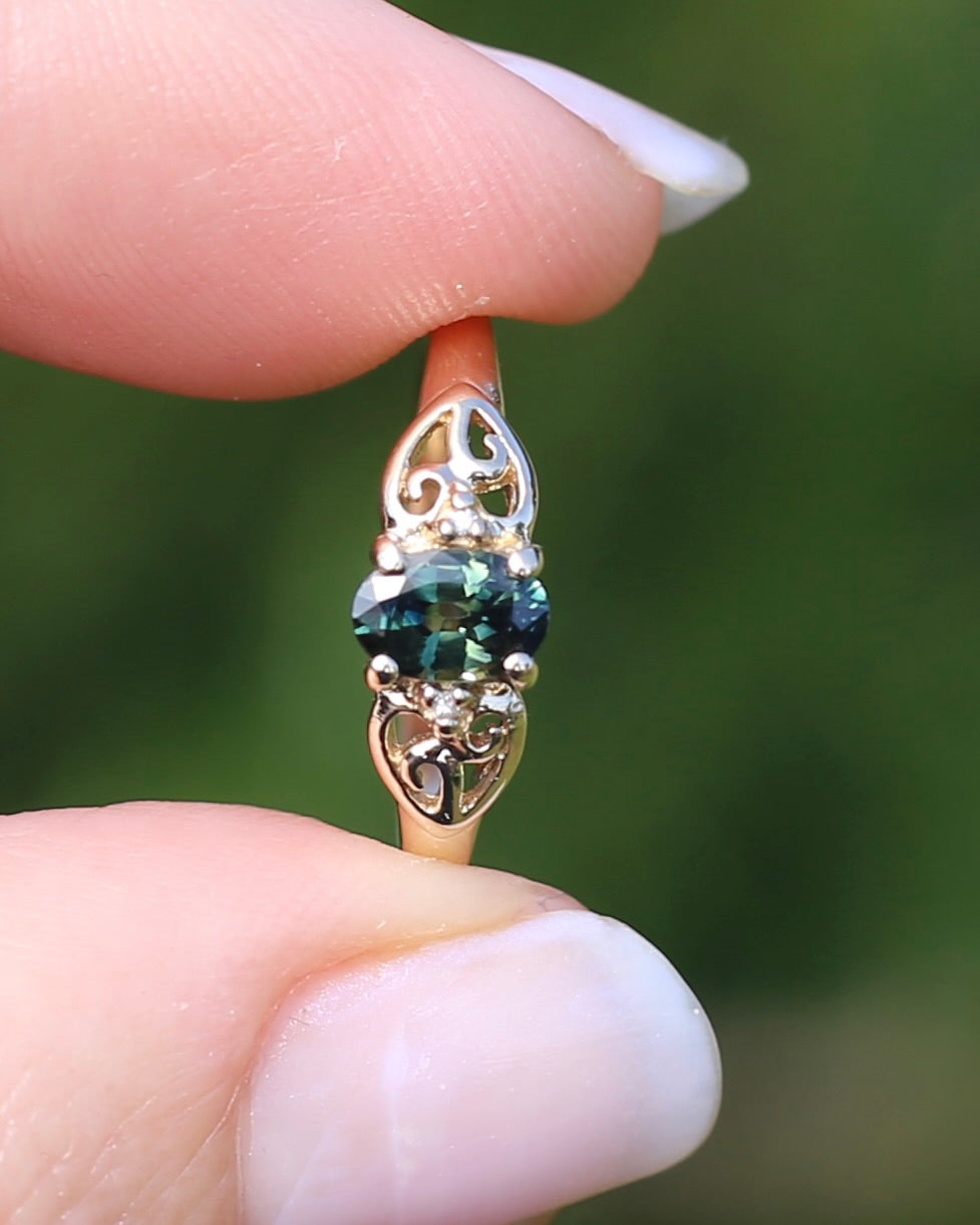 0.75ct Natural Teal Green Parti Sapphire with tiny Diamond Set Swirl Shoulders, 9ct Yellow Gold, size M1/2  or  just under 6.5, 1.44g