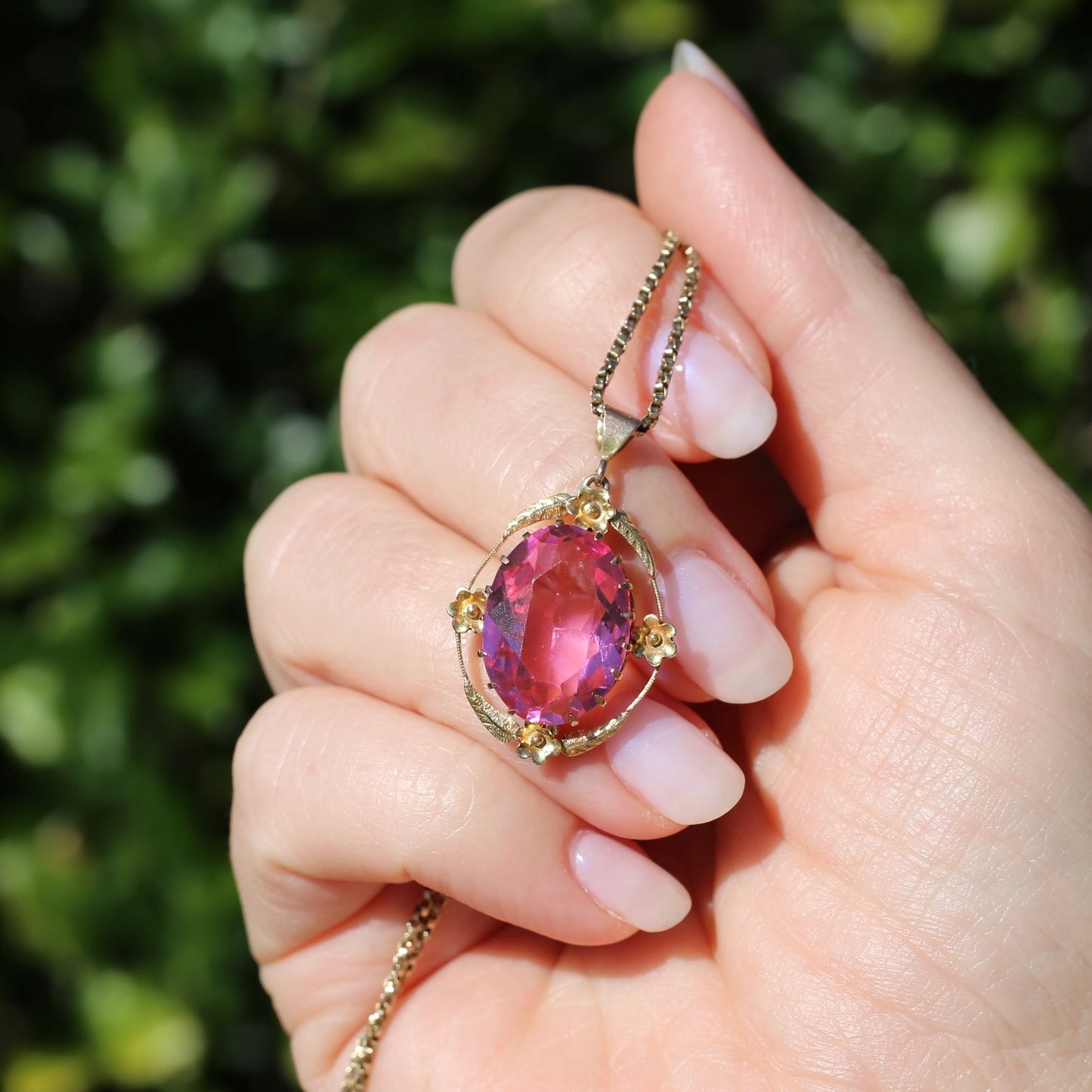 Circa 1930s-1950s Pink Paste Pendant in Decorative 9ct Gold Floral Surround, 4.23g