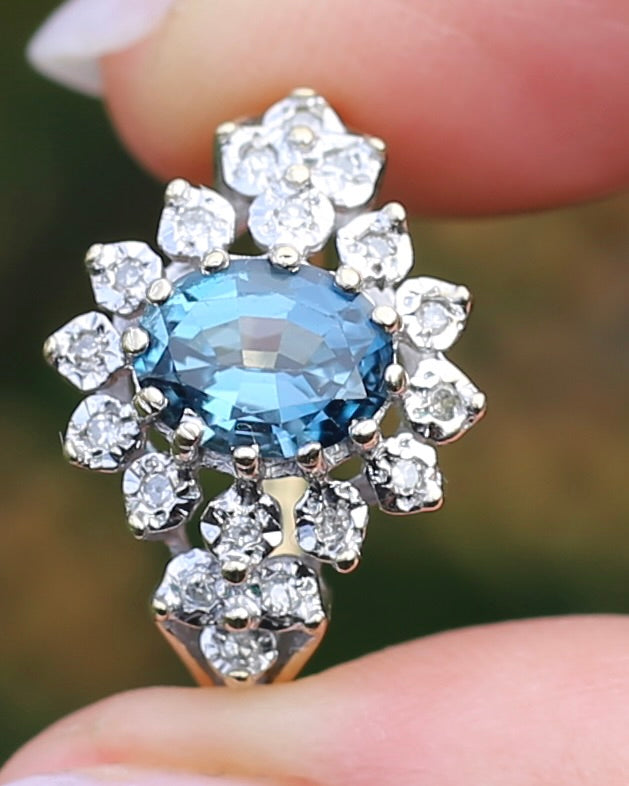 1989 Blue Zircon and Diamond Halo Ring, 9ct Yellow and White Gold, size N1/2 or 7, 3.18g