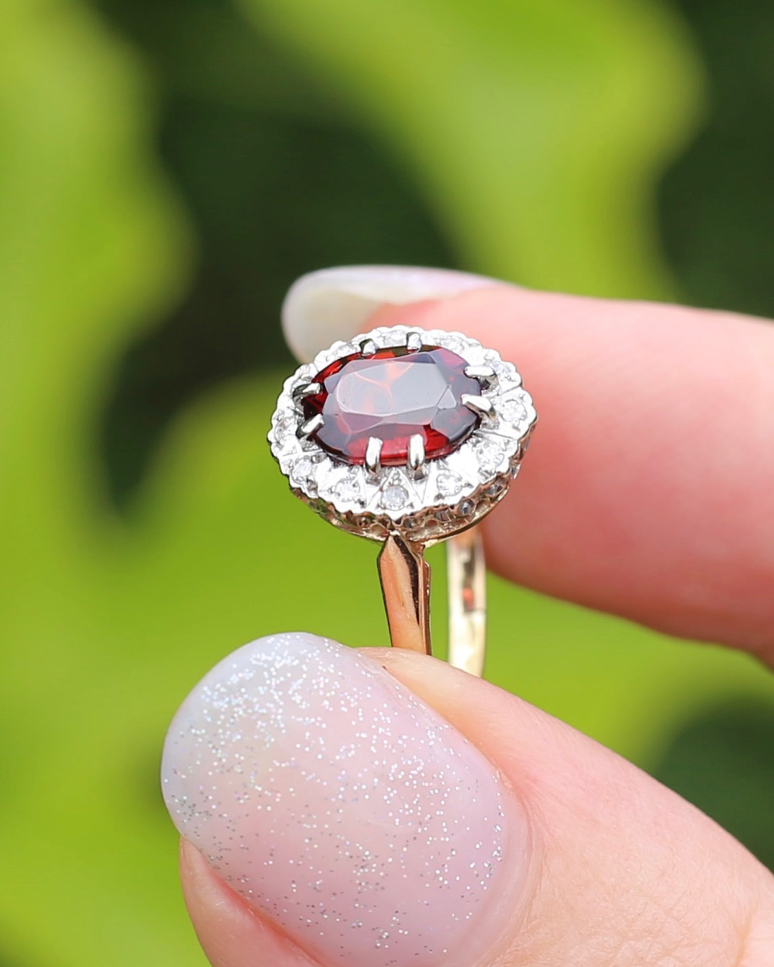 1974 Made Garnet and Diamond Halo Ring, 9ct Yellow and White Gold, size M1/2 or 6.5, 2.83g