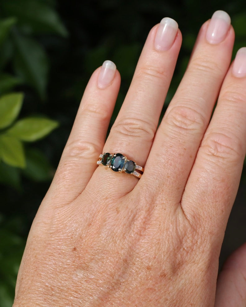 2.49ct Australian Green and Parti Sapphire Trilogy with diamond side stones, 10ct Yellow Gold, size 7 or just over N1/2, 3.38g