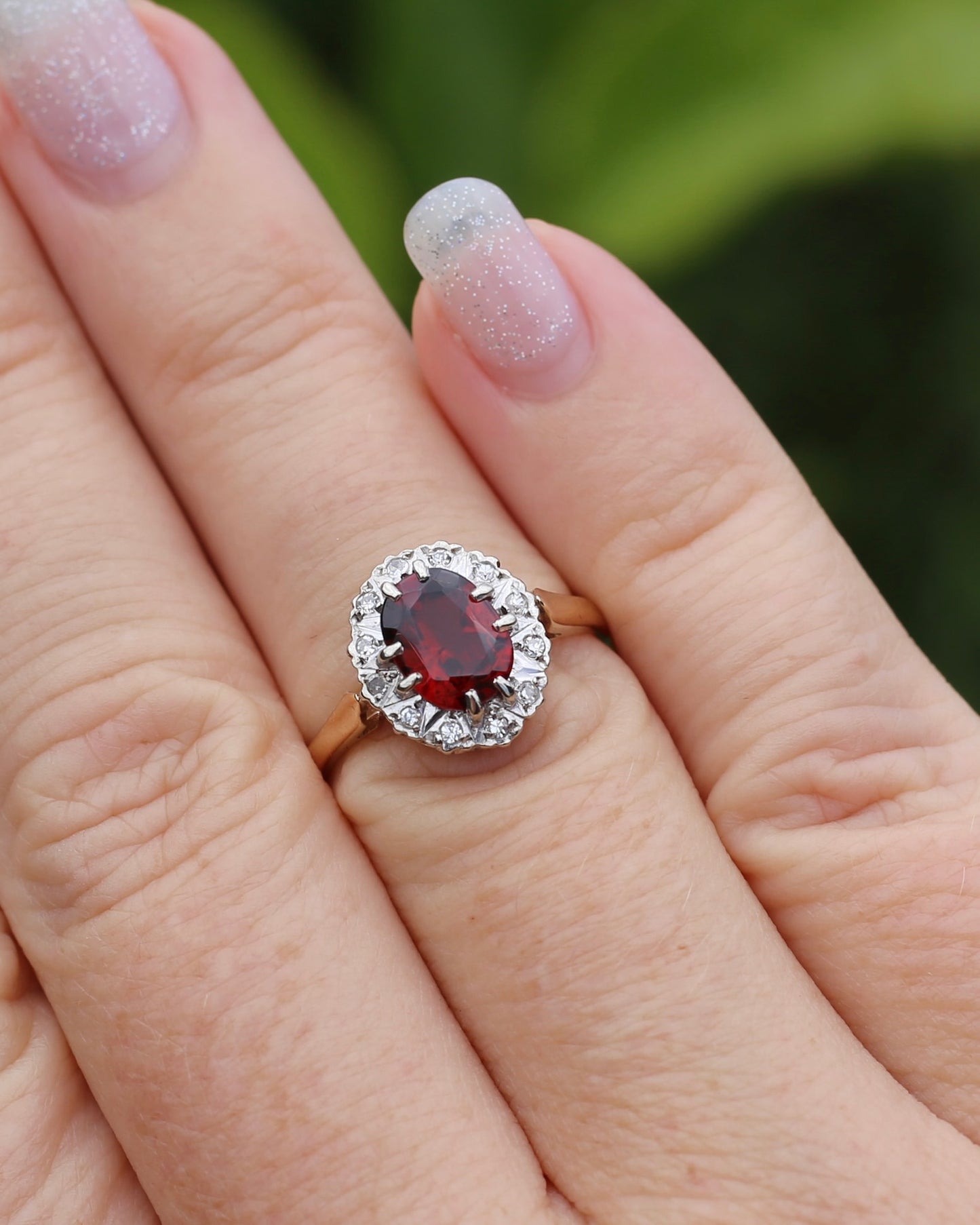1974 Made Garnet and Diamond Halo Ring, 9ct Yellow and White Gold, size M1/2 or 6.5, 2.83g