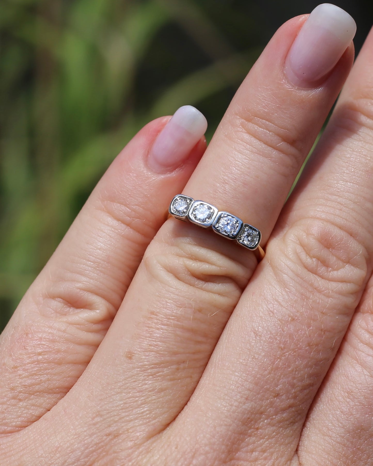 Circa 1930s Four Stone "Quadrillo" Diamond Ring, 18ct Yellow Gold and Paladium, size just over K1/2 or just over 5.5, 3.04g, with valuation
