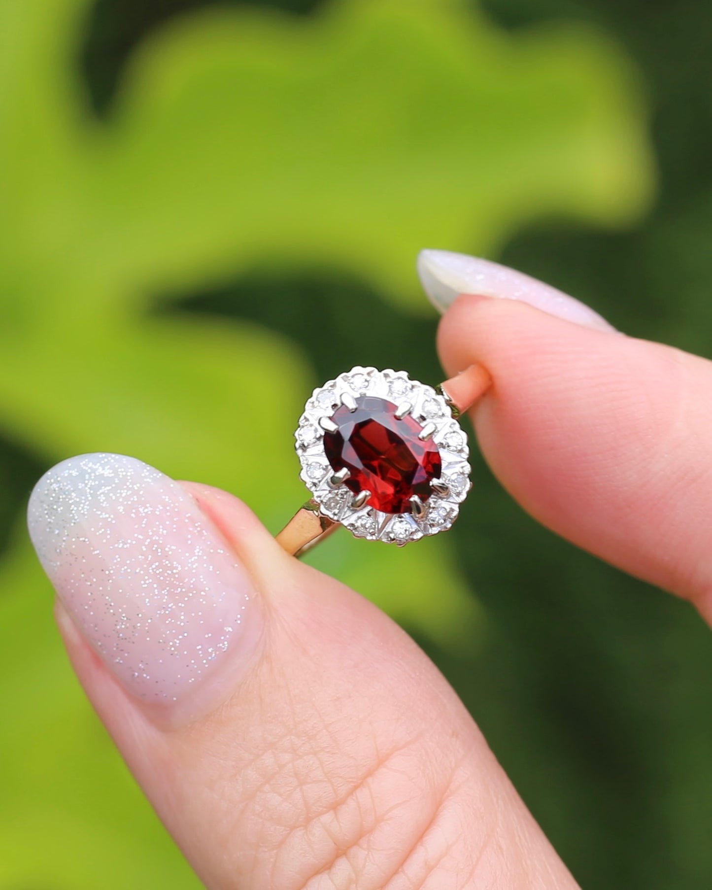 1974 Made Garnet and Diamond Halo Ring, 9ct Yellow and White Gold, size M1/2 or 6.5, 2.83g