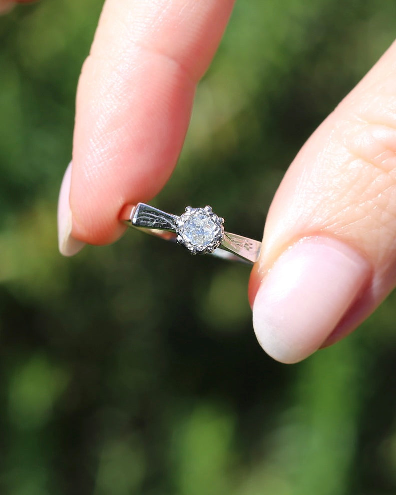 0.22ct old cut diamond solitaire, Platinum and Pale 18ct Gold, size P1/2