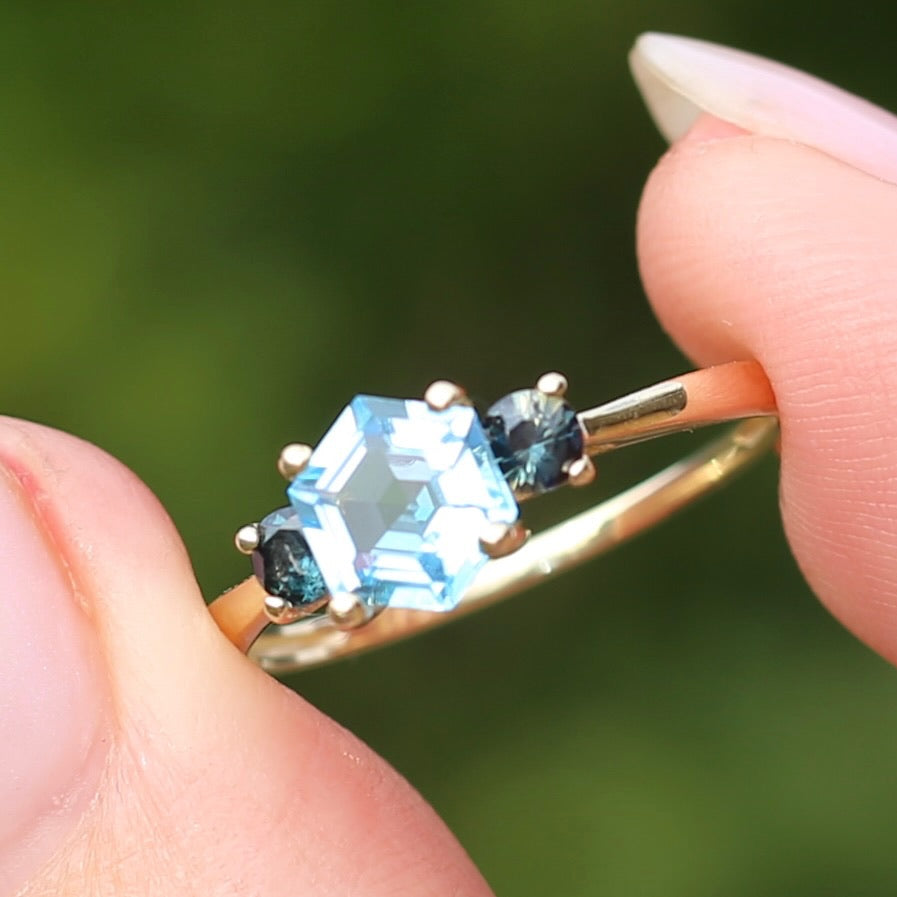 Hexagonal Blue Topaz and Parti Sapphire Trilogy, 9ct Yellow Gold, size O or 7.25