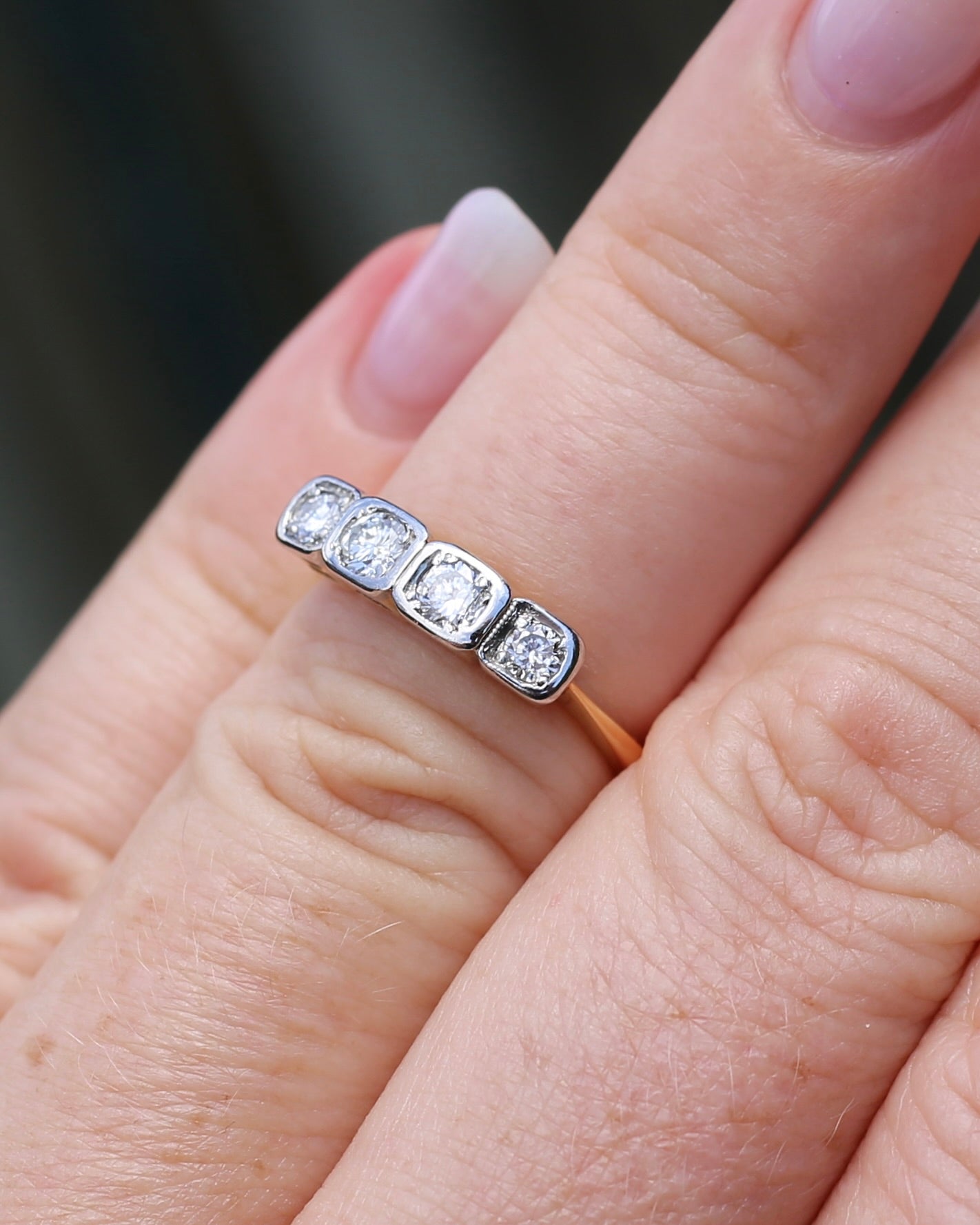 Circa 1930s Four Stone "Quadrillo" Diamond Ring, 18ct Yellow Gold and Paladium, size just over K1/2 or just over 5.5, 3.04g, with valuation