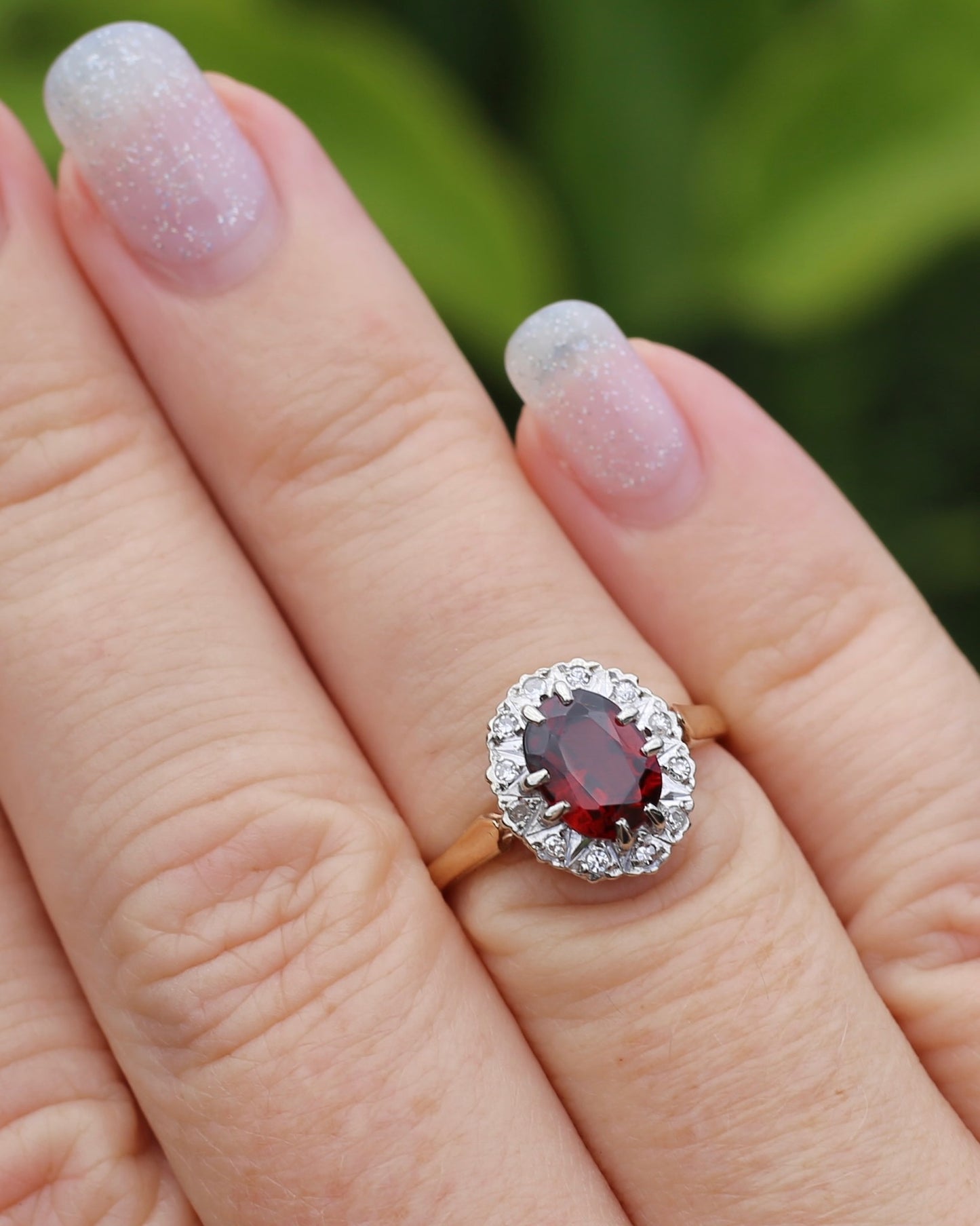1974 Made Garnet and Diamond Halo Ring, 9ct Yellow and White Gold, size M1/2 or 6.5, 2.83g