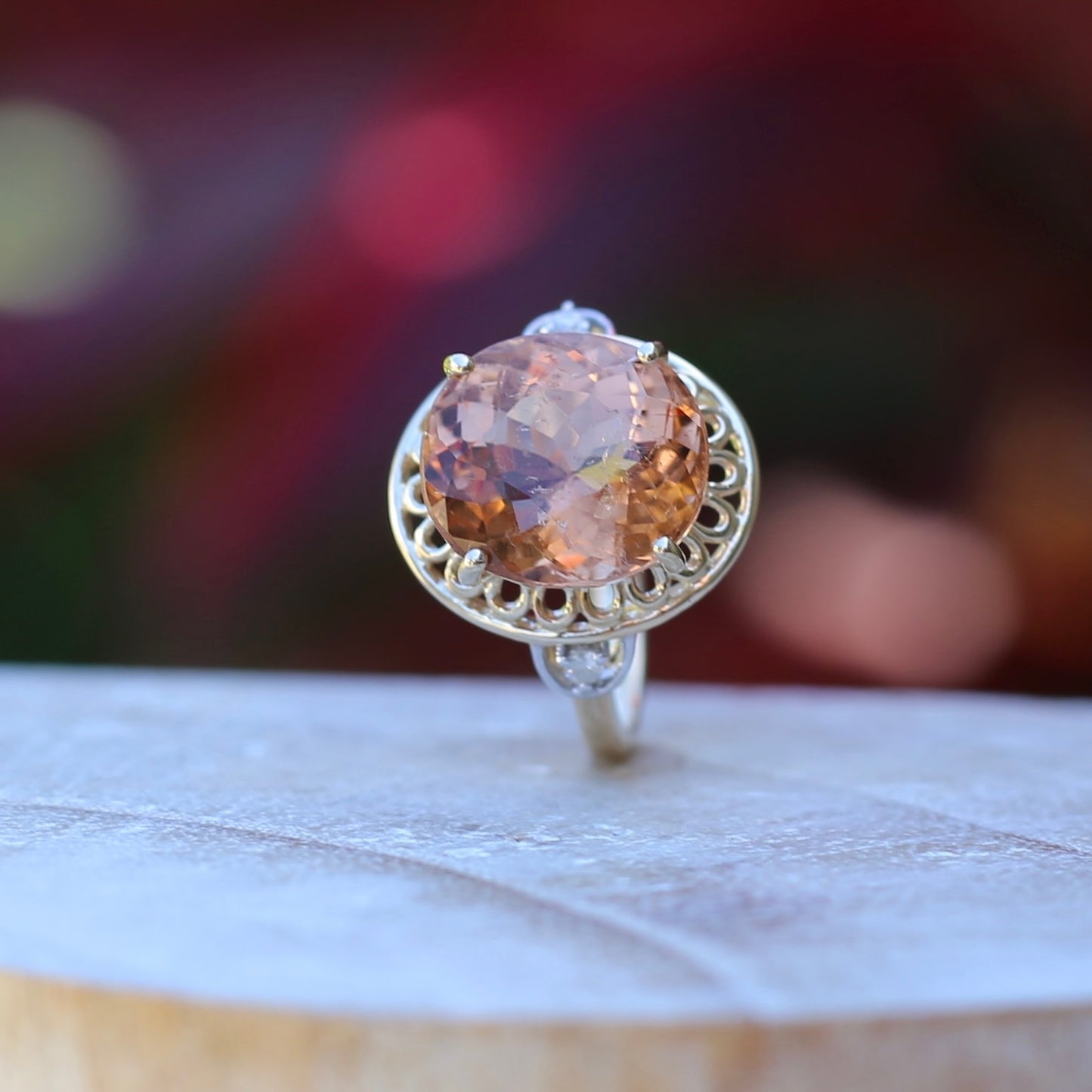 Oval Peach Tourmaline Ring with Pierced Wire Surrounds and Diamonds in the Shoulders, 9ct Yellow Gold, size N or 6.75