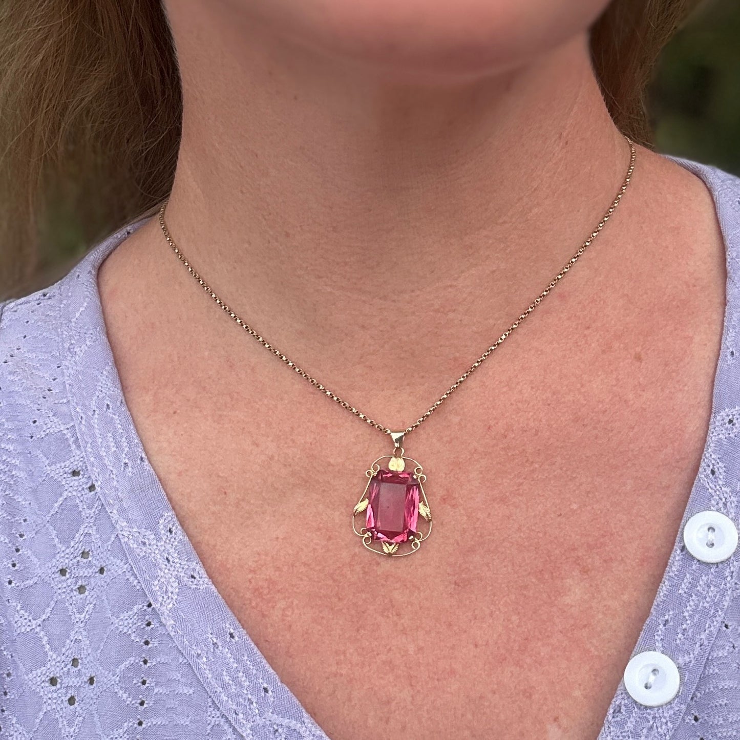 Circa 1930s-1950s Pink Paste Pendant in Decorative 9ct Gold Leaf Surround, 4.95g