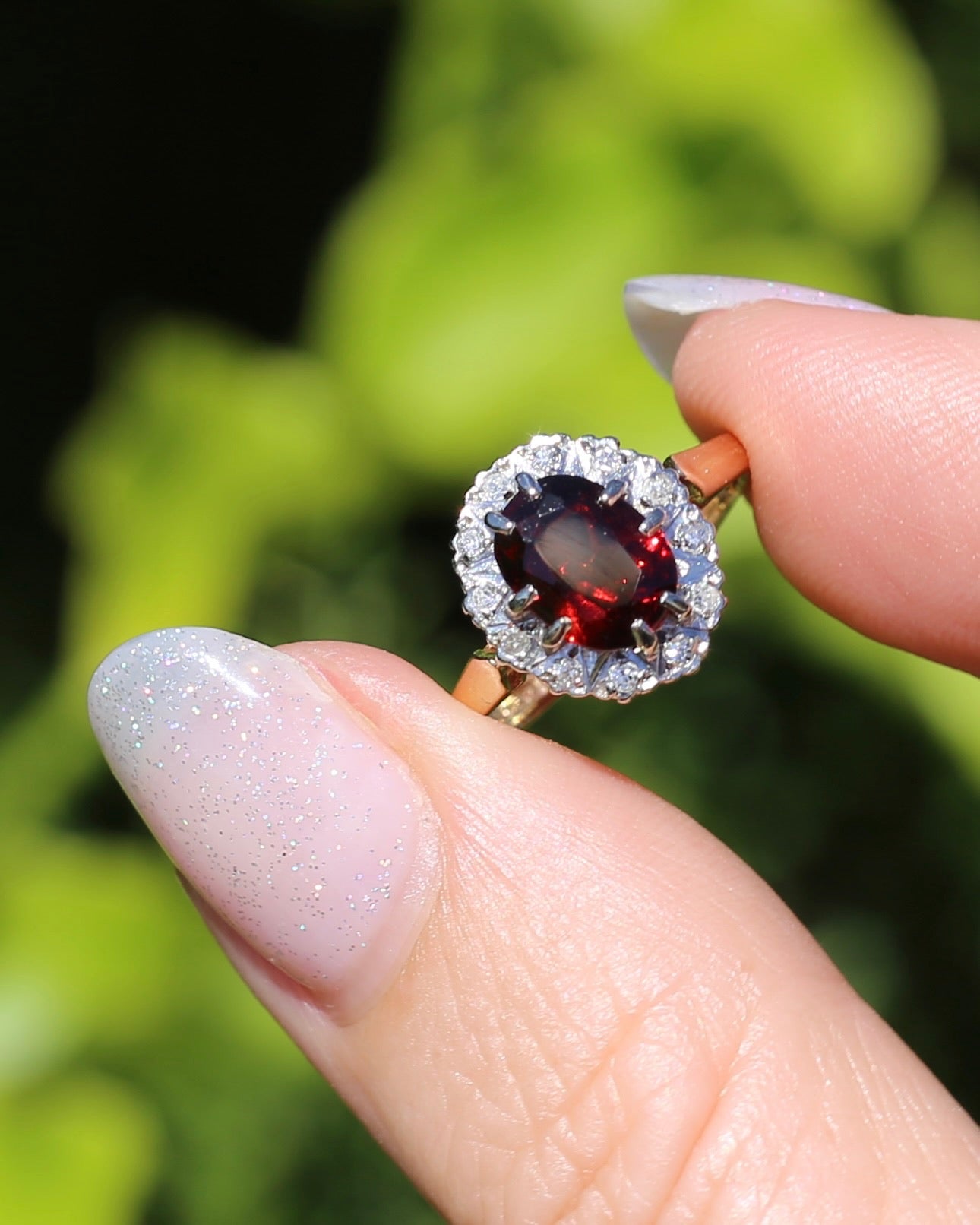 1974 Made Garnet and Diamond Halo Ring, 9ct Yellow and White Gold, size M1/2 or 6.5, 2.83g