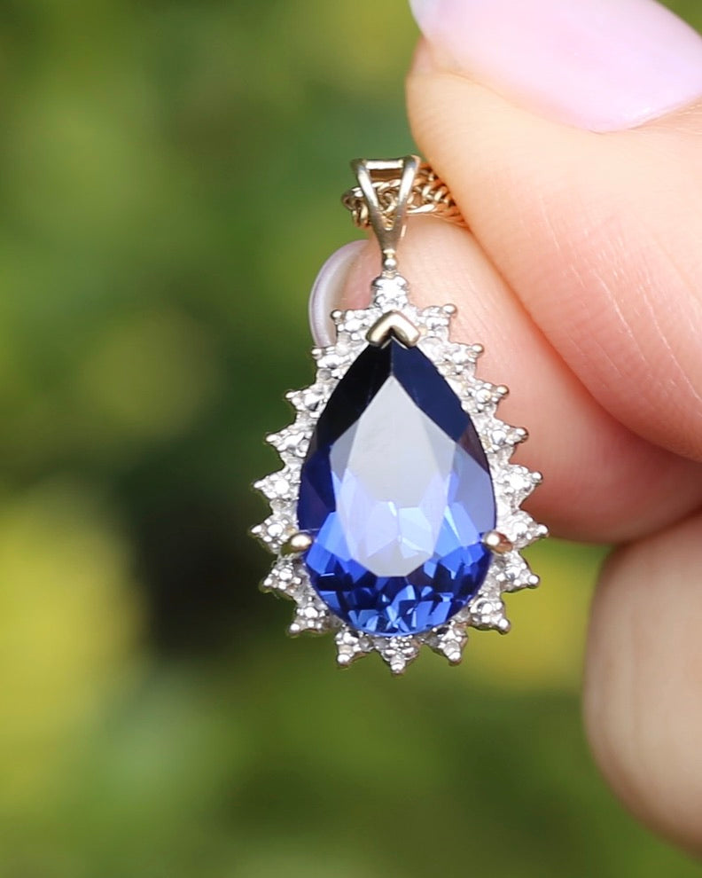 5ct Lab Grown Sapphire and Illusion Set Pendant with 2 Diamonds, 9ct Yellow Gold (some Rhoidum Plating), 2.47g