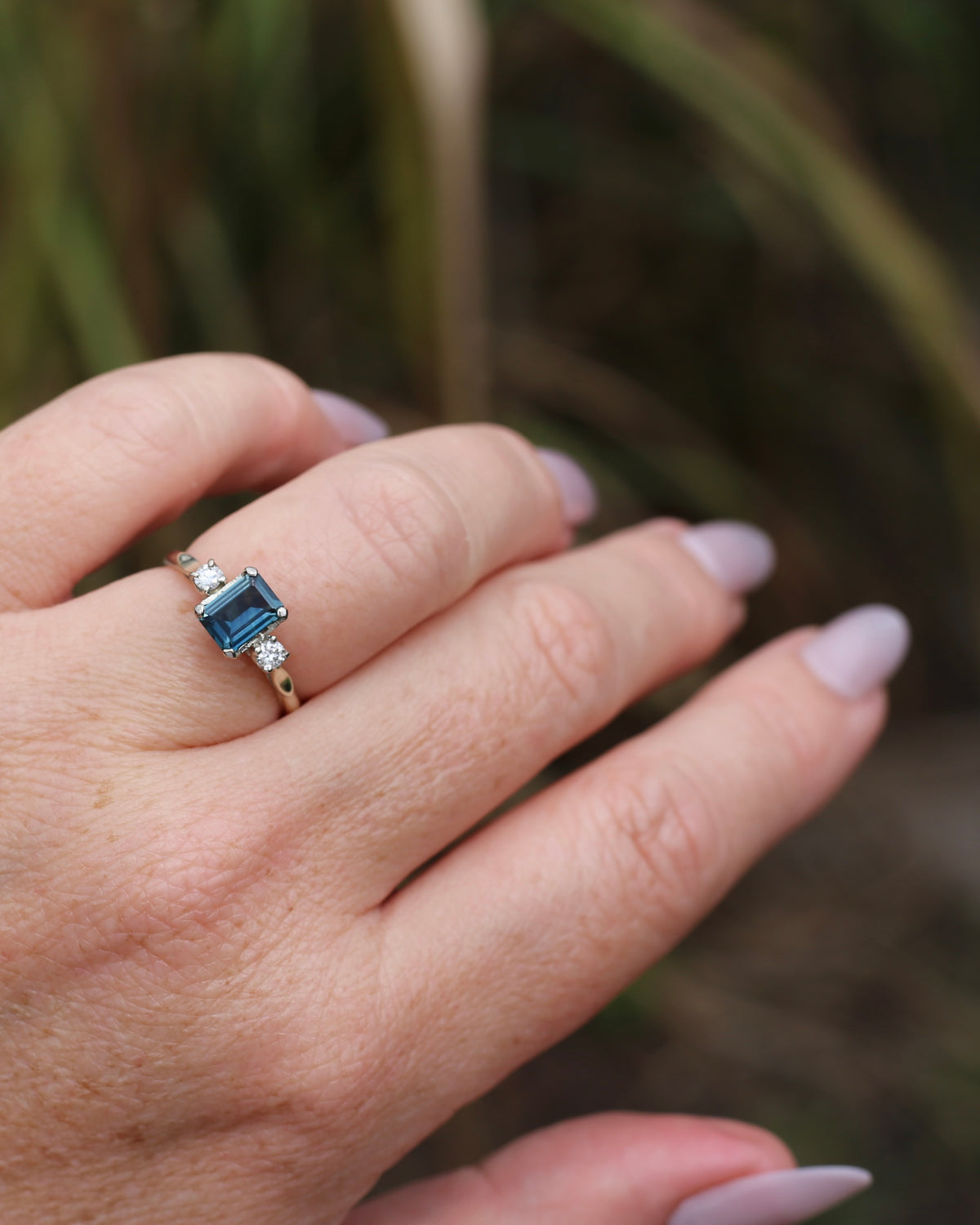 1.1ct Emerald Cut Natural Blue Teal Sapphire and Diamond Trilogy, 18ct White Gold and Platinum, size O or just over 7, 2.27g