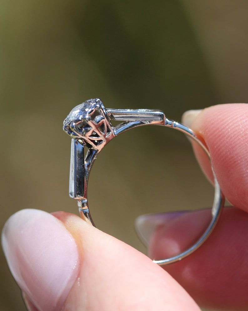 0.22ct old cut diamond solitaire, Platinum and Pale 18ct Gold, size P1/2