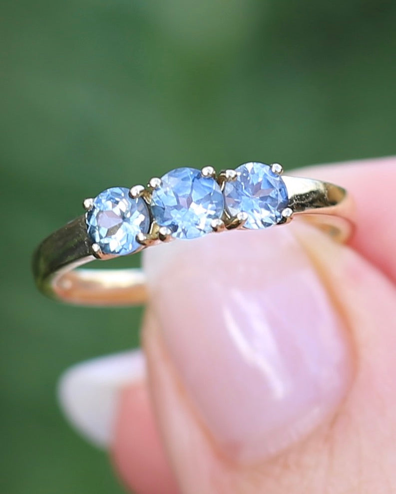 1.5ct Pale Cornflower Blue Parti Trilogy, Claw Set 9ct Yellow Gold, size Q or 8.25, 2.17g