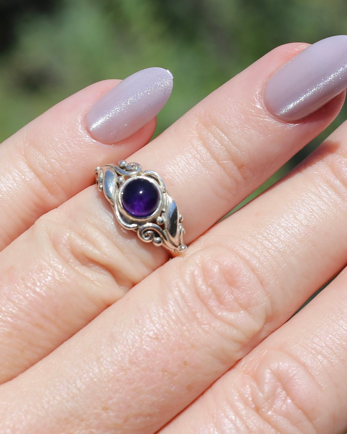 Amethyst Cabochon in Bezel Setting and Leaf & Swirl Surrounds, Sterling Silver, size J1/2 or 5, 3.38g