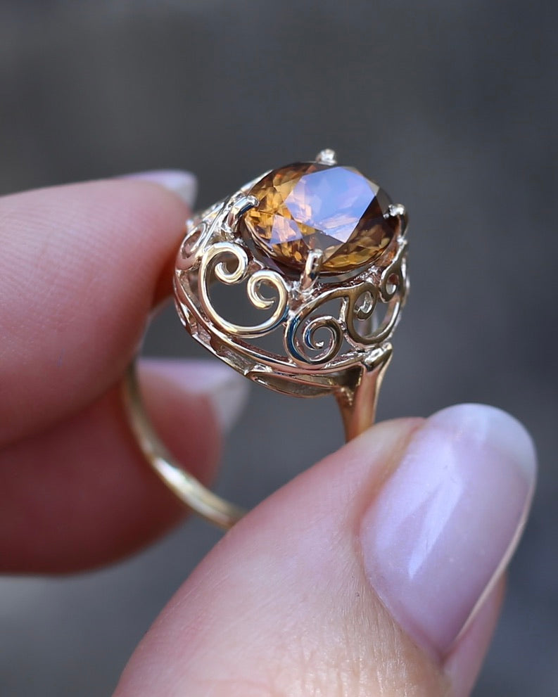 6.9ct Oval Natural Zircon in Raised Filigree Setting, 10ct Yellow Gold, size M1/2 or 6.5, 4.83g