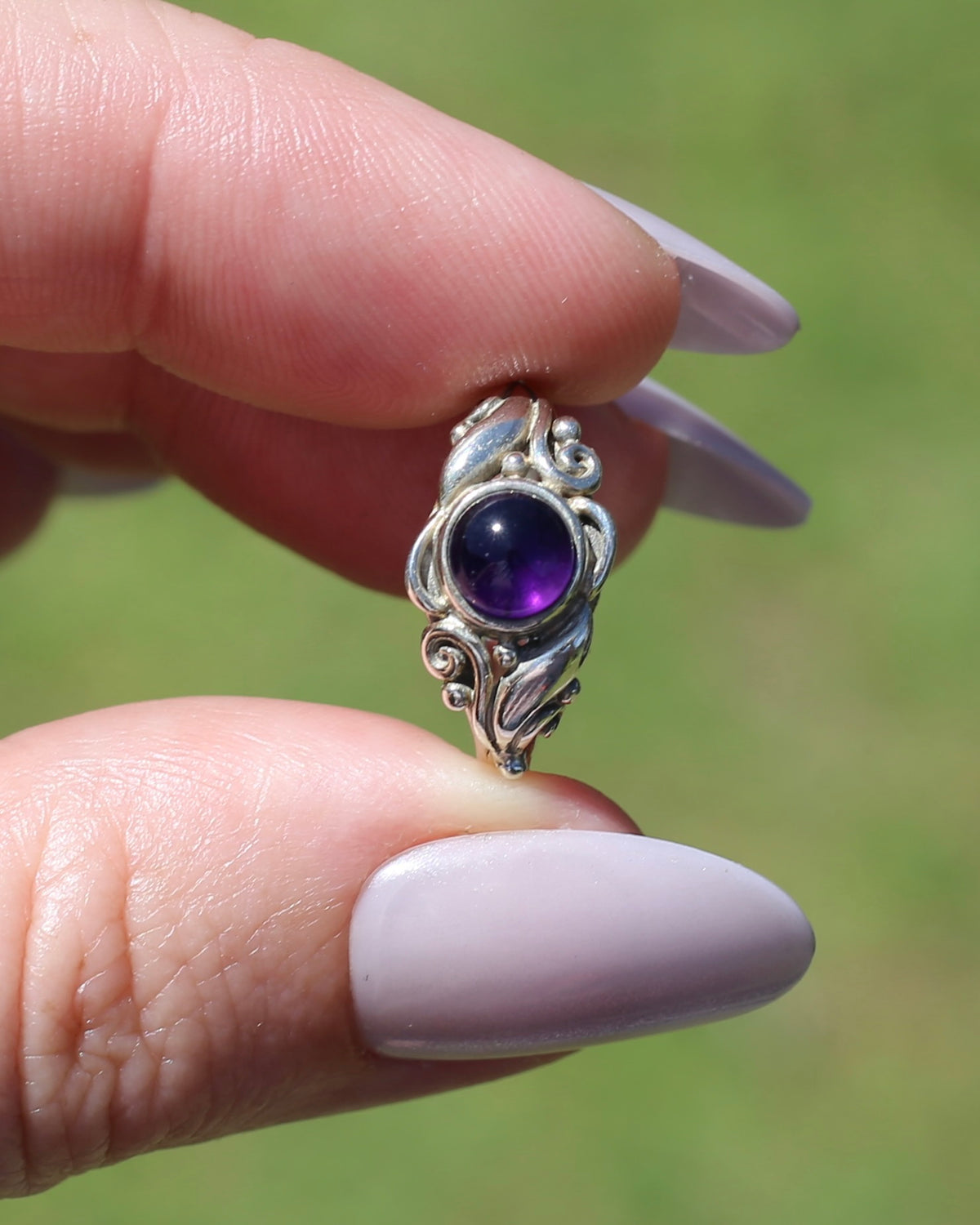 Amethyst Cabochon in Bezel Setting and Leaf & Swirl Surrounds, Sterling Silver, size J1/2 or 5, 3.38g