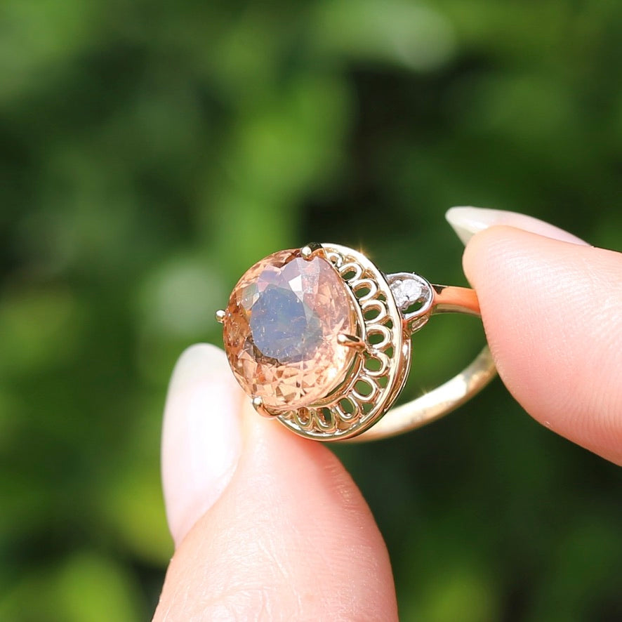 Oval Peach Tourmaline Ring with Pierced Wire Surrounds and Diamonds in the Shoulders, 9ct Yellow Gold, size N or 6.75