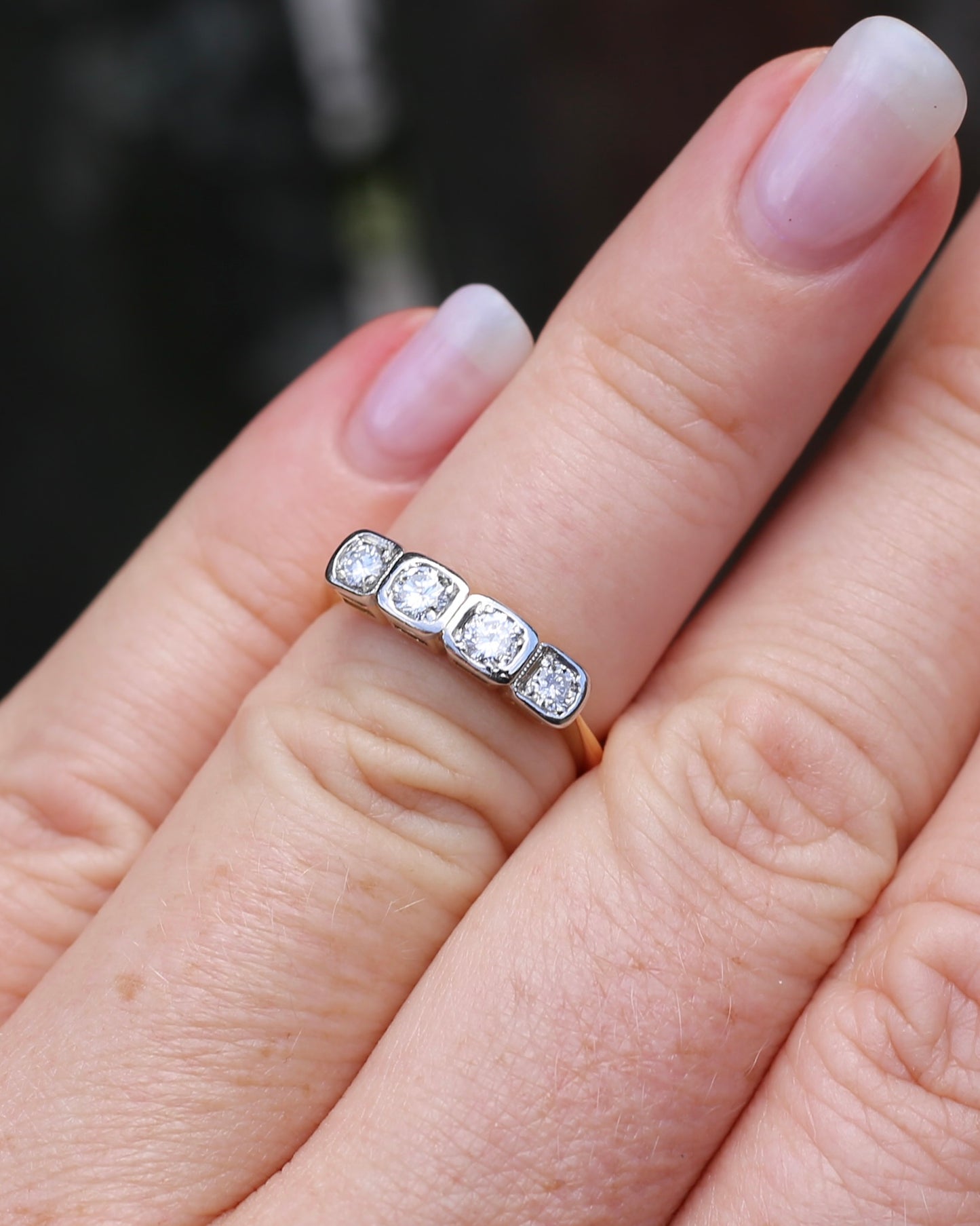 Circa 1930s Four Stone "Quadrillo" Diamond Ring, 18ct Yellow Gold and Paladium, size just over K1/2 or just over 5.5, 3.04g, with valuation