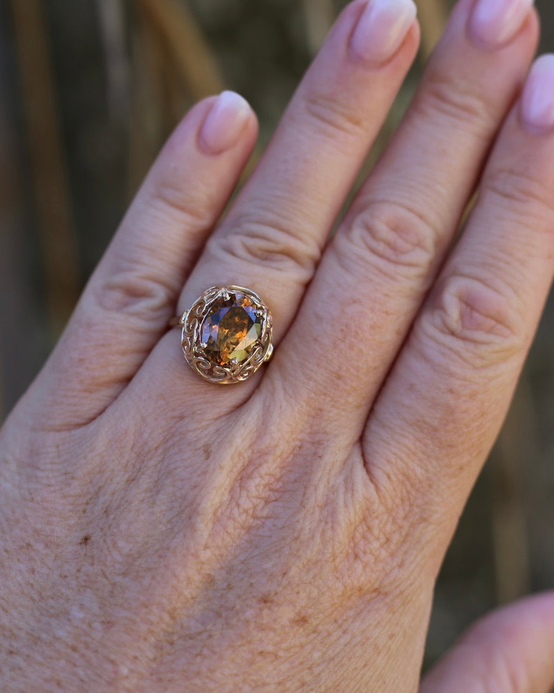 6.9ct Oval Natural Zircon in Raised Filigree Setting, 10ct Yellow Gold, size M1/2 or 6.5, 4.83g