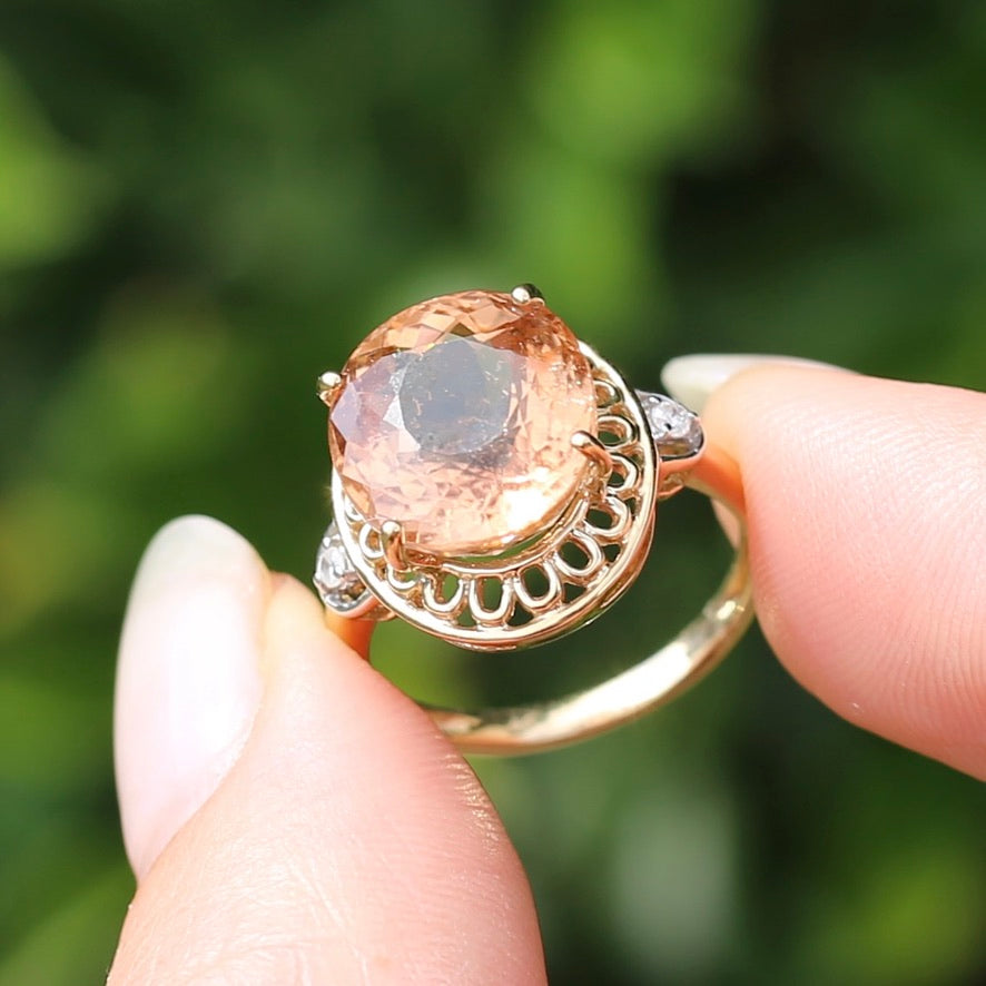 Oval Peach Tourmaline Ring with Pierced Wire Surrounds and Diamonds in the Shoulders, 9ct Yellow Gold, size N or 6.75