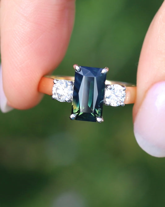 Circa 1970 Octagonal Step Cut Untreated Sapphire and Diamond Trilogy Ring, 18ct Yellow Gold and Platinum, size T or 9.5, 6.15g, with valuation