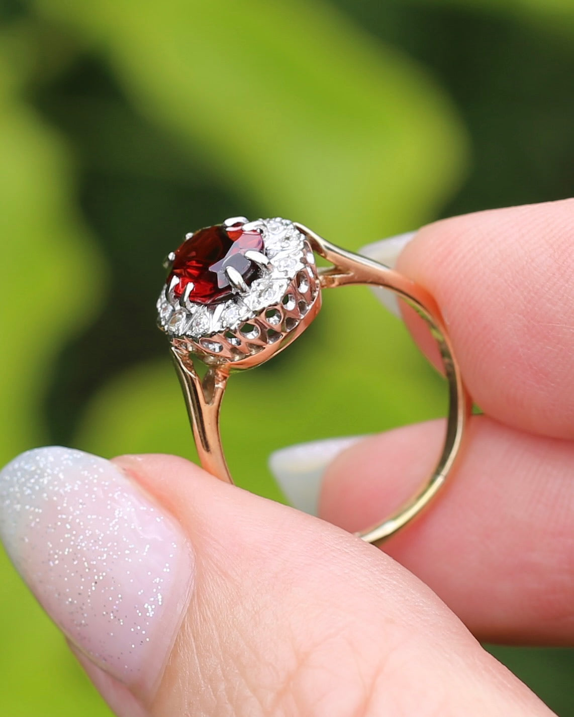 1974 Made Garnet and Diamond Halo Ring, 9ct Yellow and White Gold, size M1/2 or 6.5, 2.83g