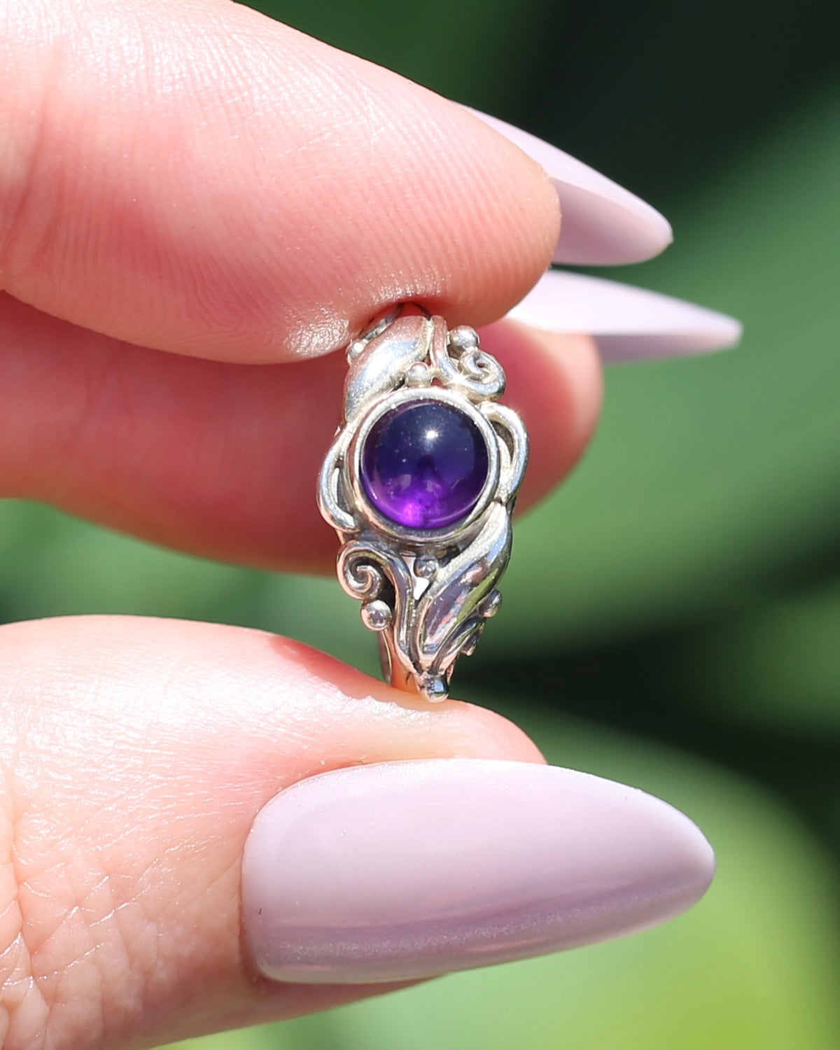 Amethyst Cabochon in Bezel Setting and Leaf & Swirl Surrounds, Sterling Silver, size J1/2 or 5, 3.38g