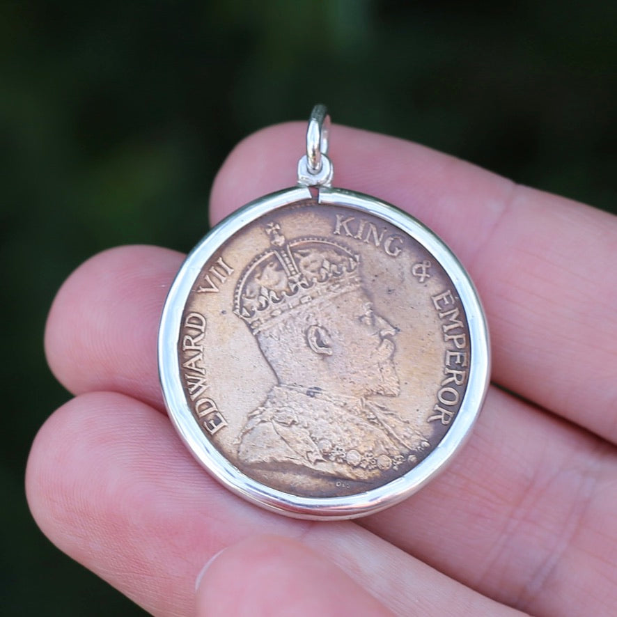 Global Coins in Silver Bezel Frames