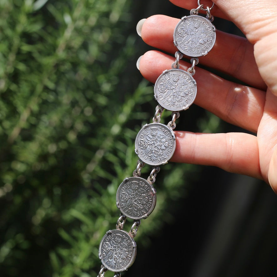 1960 - 1966 Sixpence Bracelet - set in 4 claw settings with double links, 20cm or 8 inches