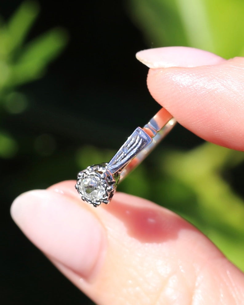 0.22ct old cut diamond solitaire, Platinum and Pale 18ct Gold, size P1/2