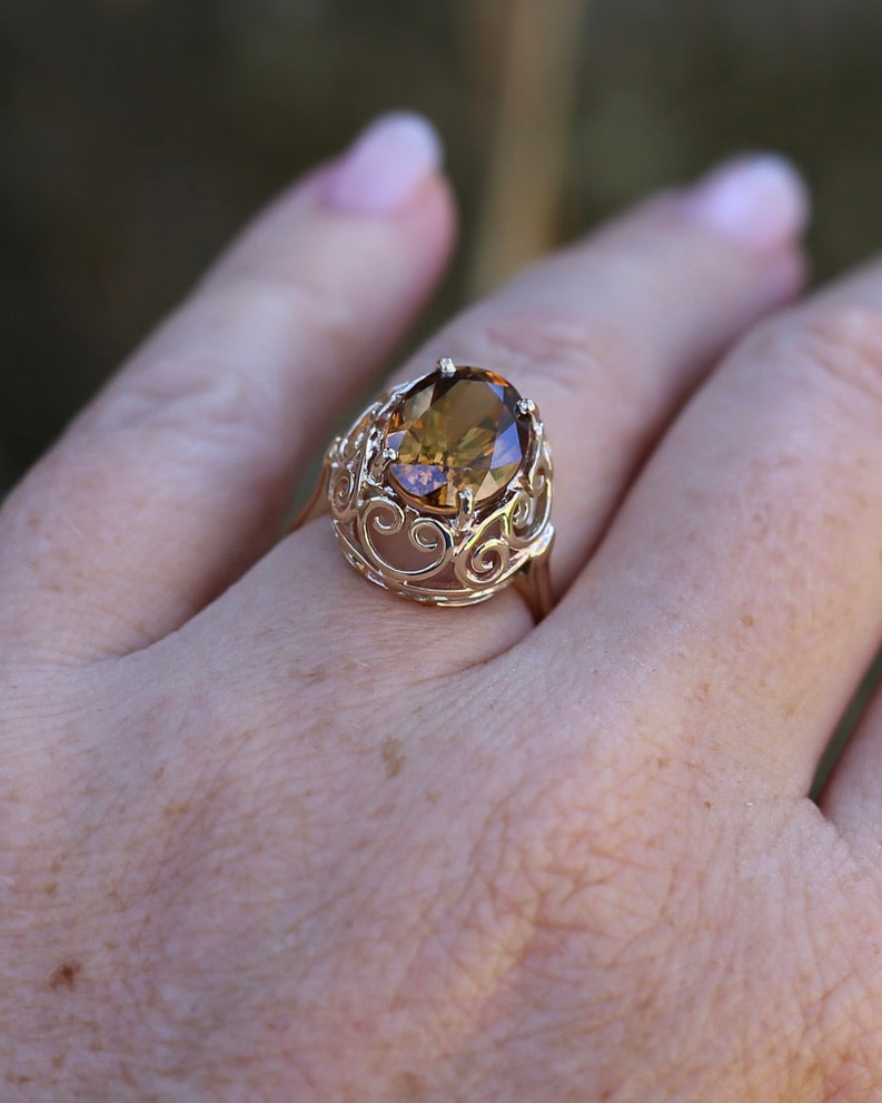 6.9ct Oval Natural Zircon in Raised Filigree Setting, 10ct Yellow Gold, size M1/2 or 6.5, 4.83g