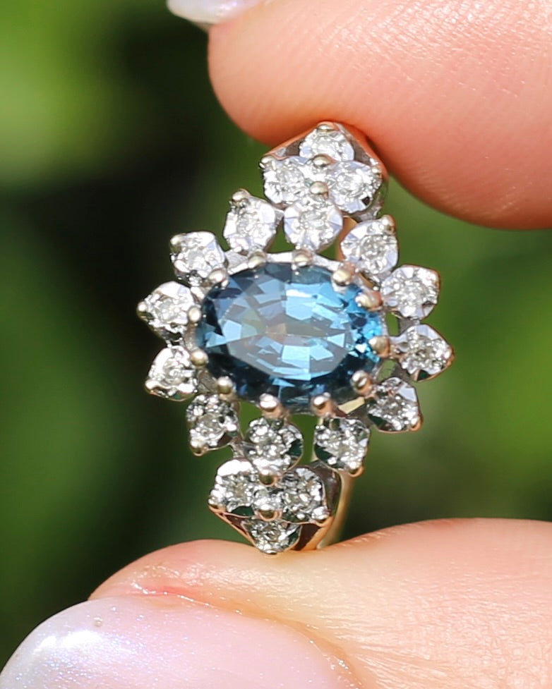 1989 Blue Zircon and Diamond Halo Ring, 9ct Yellow and White Gold, size N1/2 or 7, 3.18g