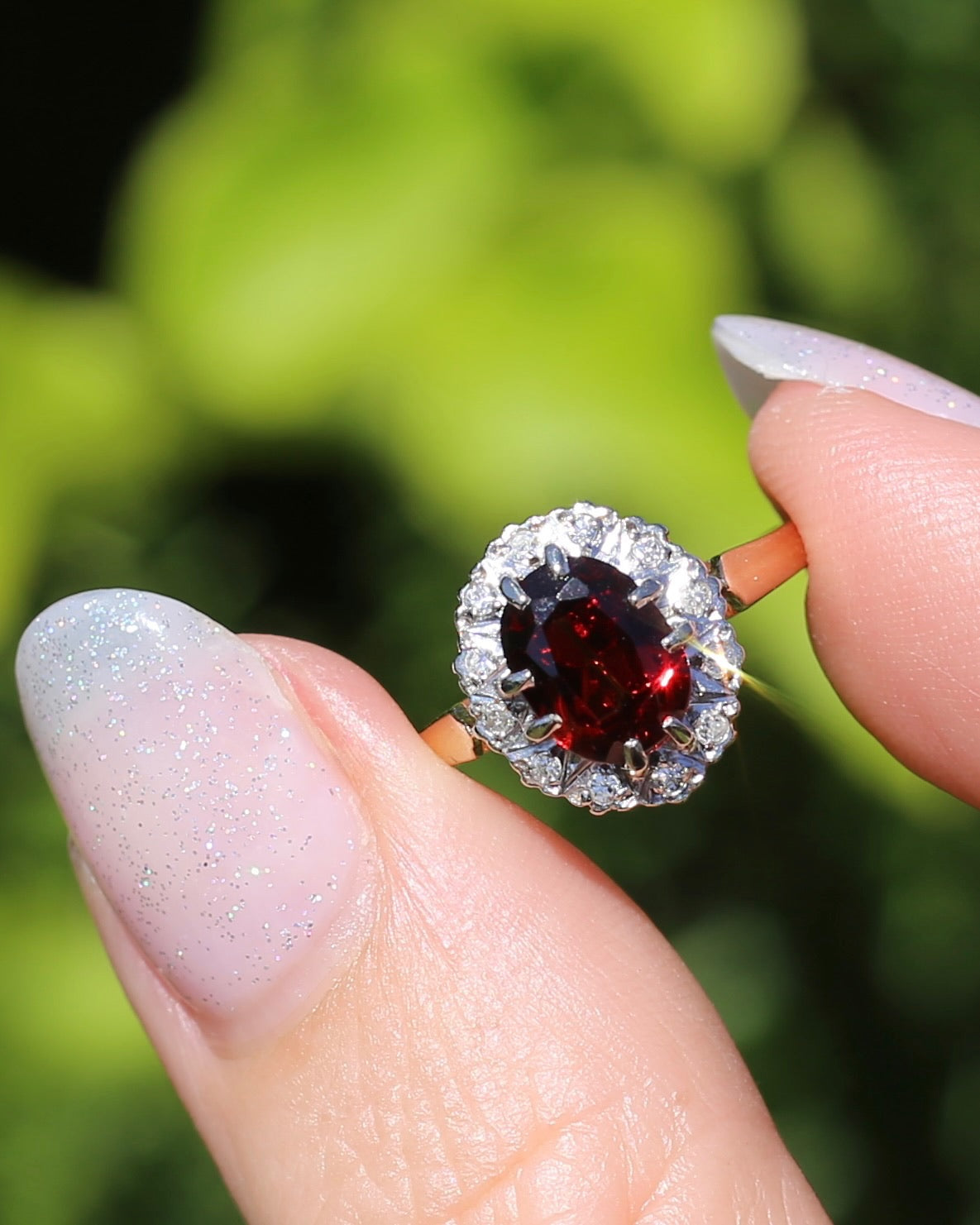 1974 Made Garnet and Diamond Halo Ring, 9ct Yellow and White Gold, size M1/2 or 6.5, 2.83g