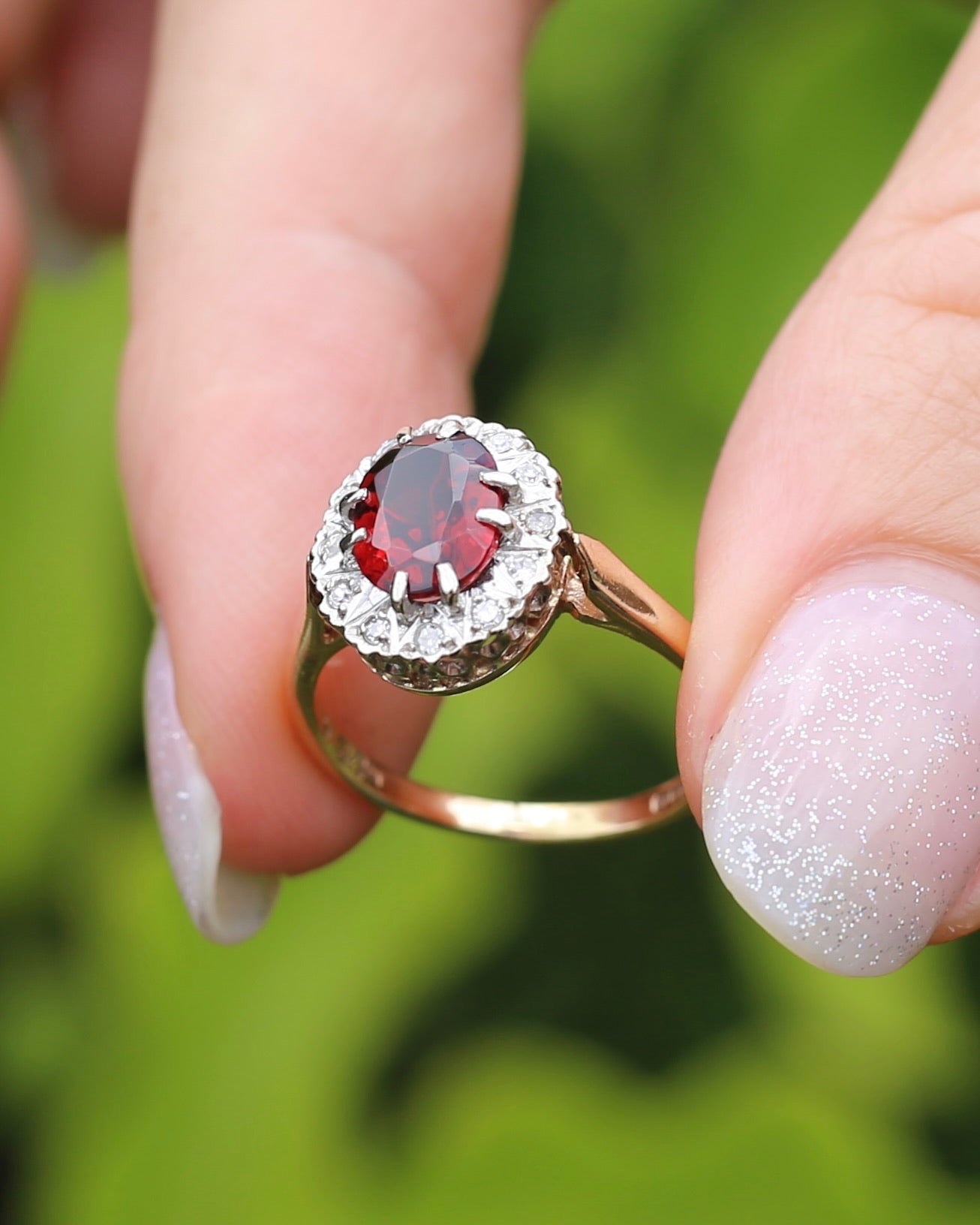 1974 Made Garnet and Diamond Halo Ring, 9ct Yellow and White Gold, size M1/2 or 6.5, 2.83g